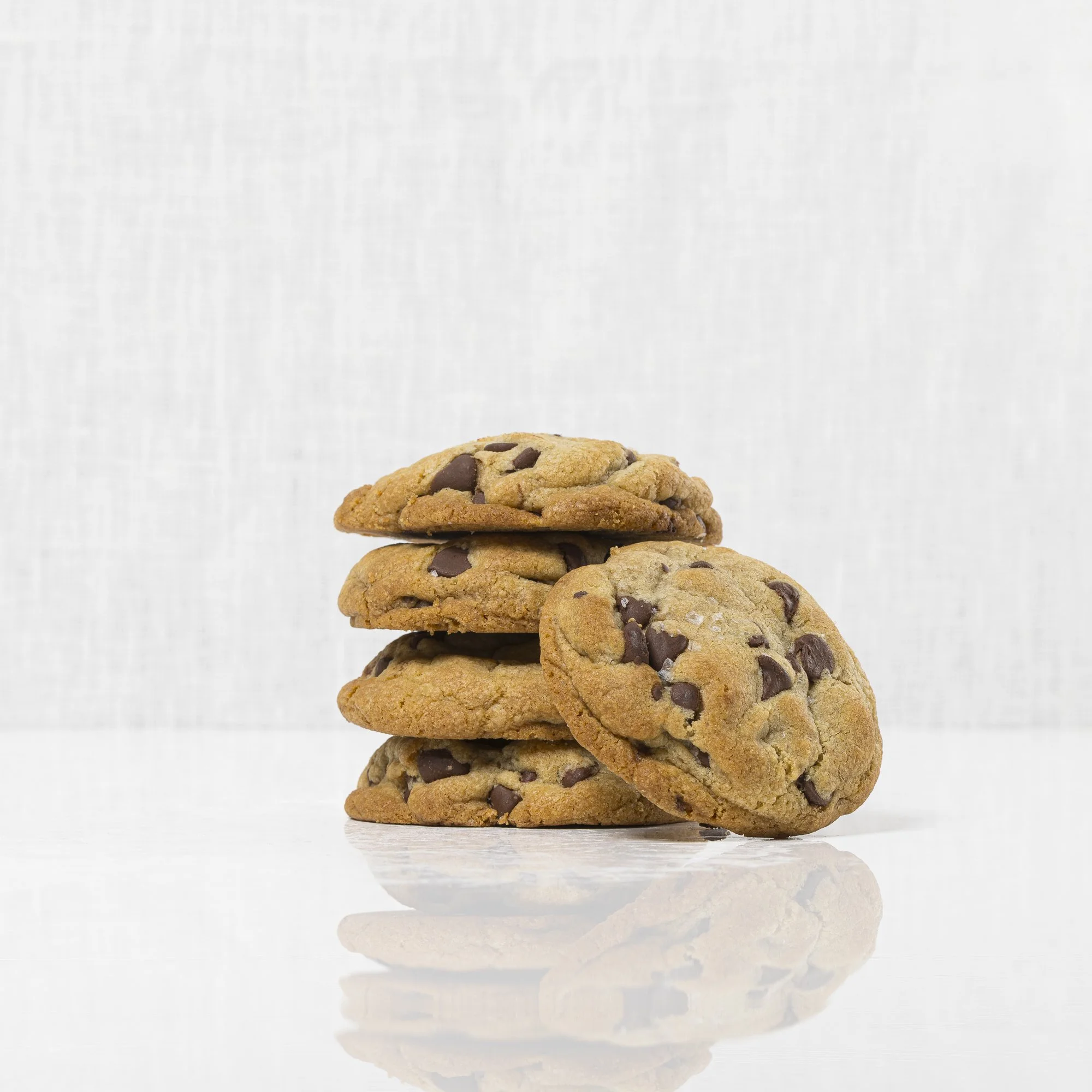 Chocolate Chip Cookie - 
Our chocolate chip cookies are made with browned butter and just the right balance of chocolate chips, topped with a sprinkling of flaky sea salt. These cookies are the result of countless recipe re-writes, all in the quest f