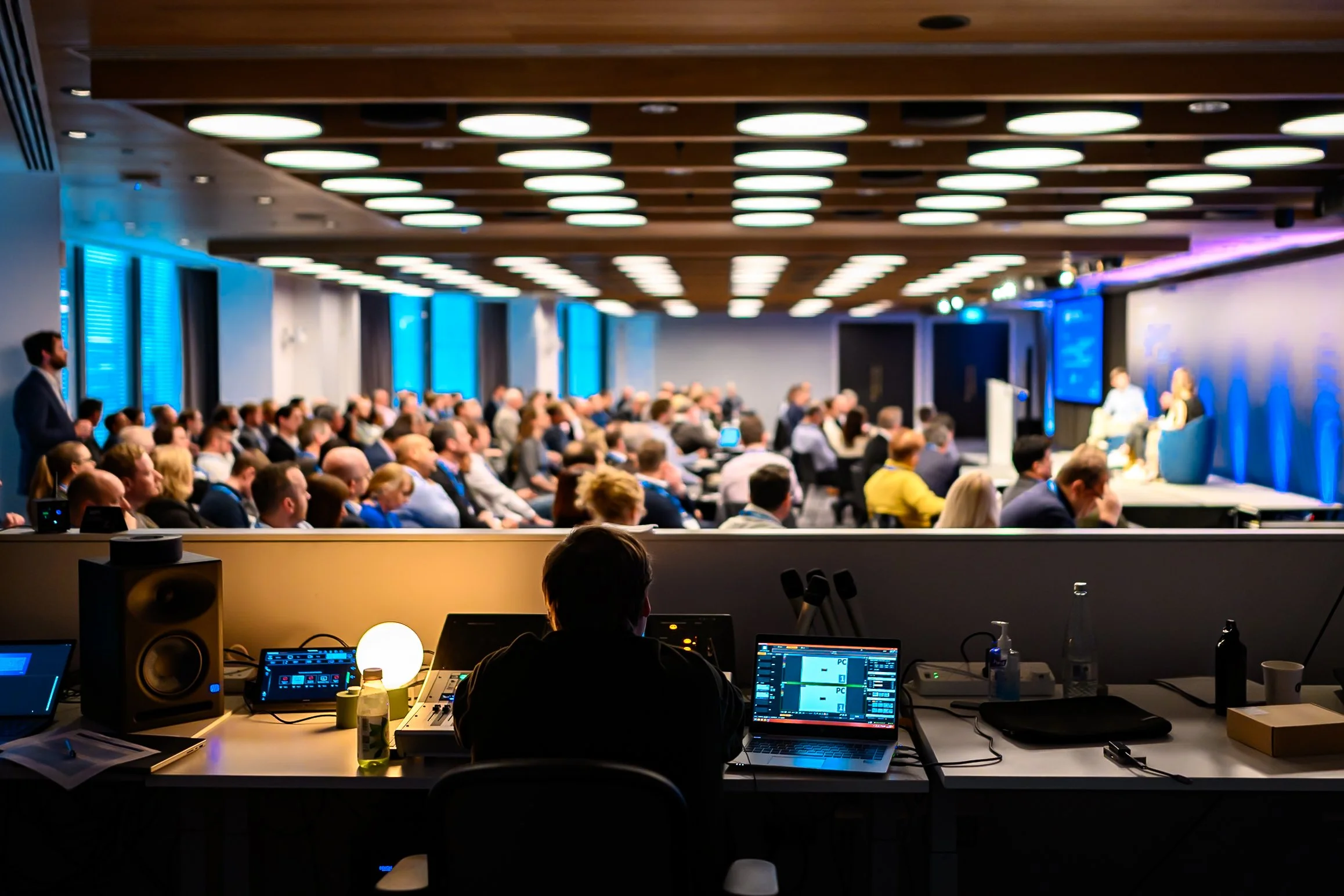 Behind-the-scenes view of live AV production and sound engineering at the NetDocuments Inspire conference, Convene 22 Bishopsgate, London. Professional corporate event photography by Will Bailey.