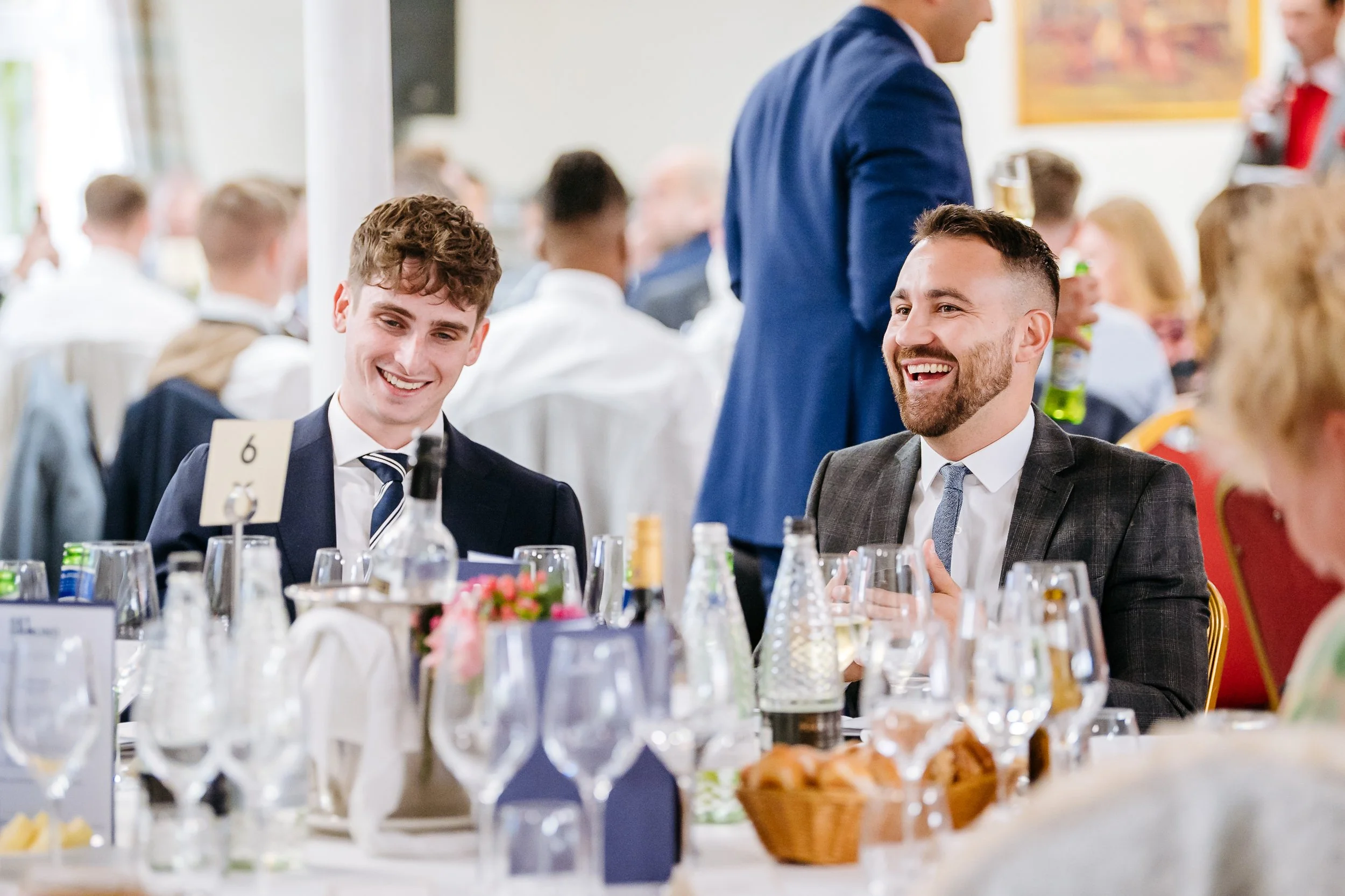 Guests sharing a candid moment during the GetGround corporate networking dinner at Ascot. Professional corporate hospitality and event photography by Will Bailey.