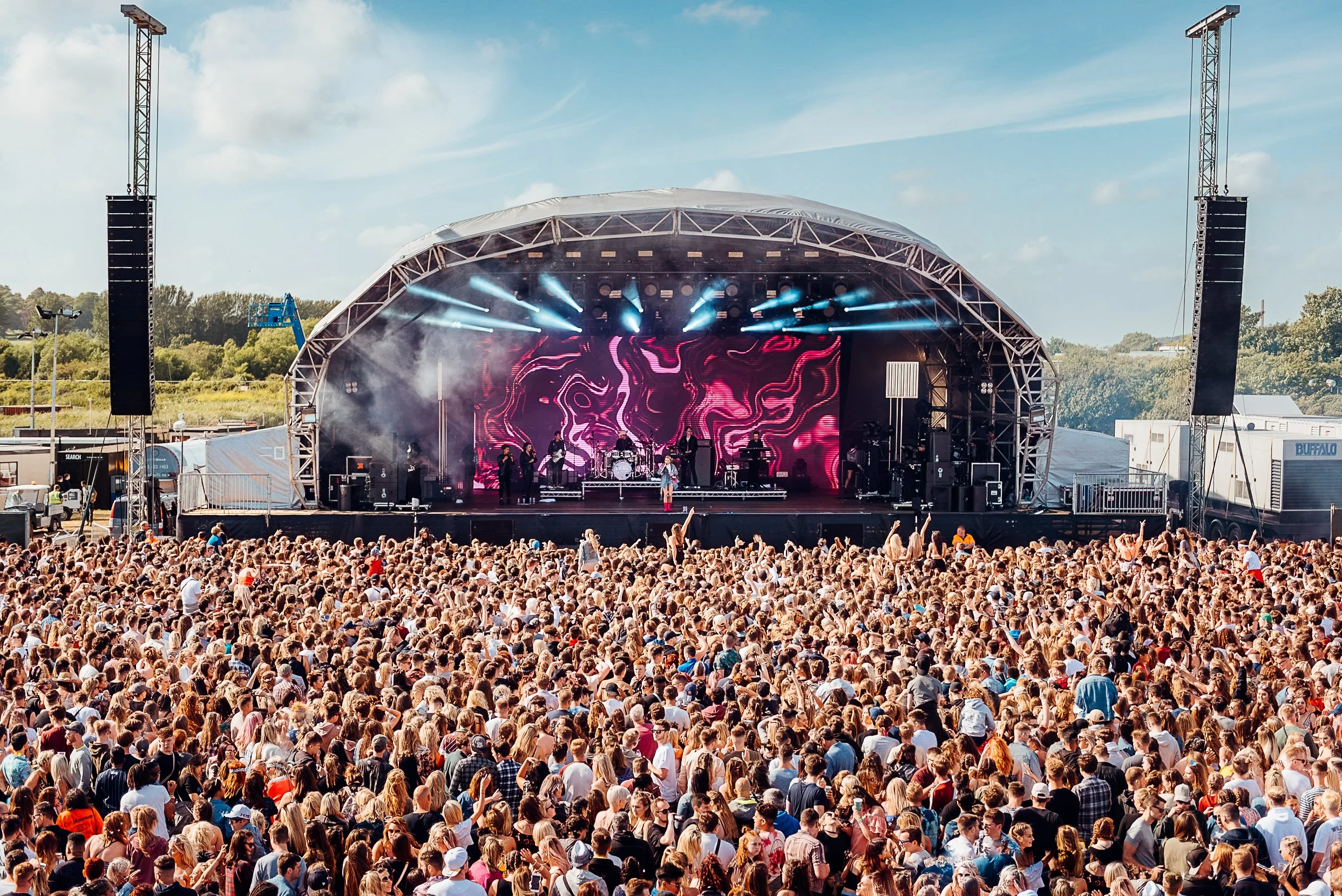 Elevated festival main stage photography capturing Zara Larsson performing live to a massive outdoor crowd at WILD LIFE Festival in Brighton, by Will Bailey.