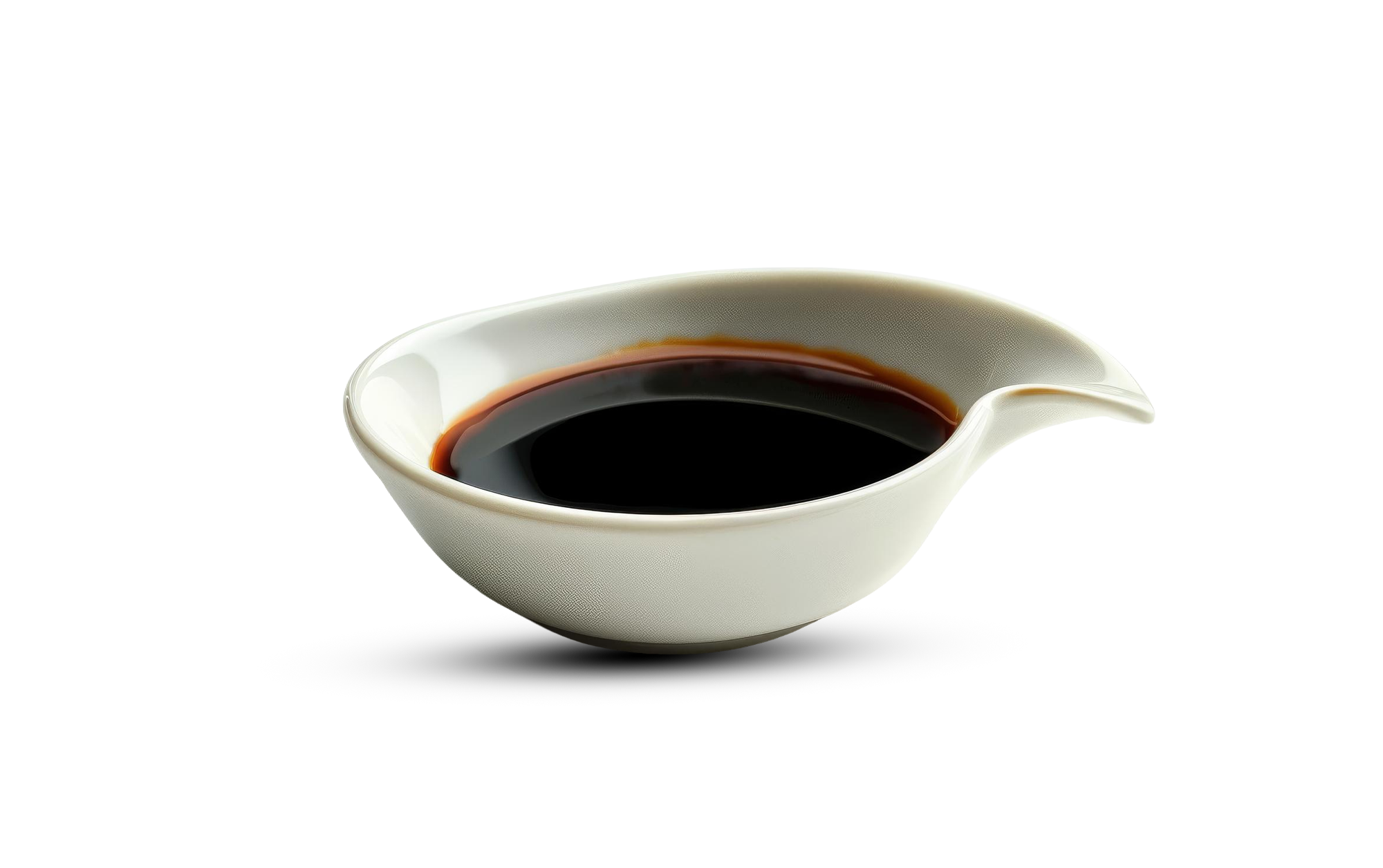 A white ceramic bowl filled with black coffee on a black background.