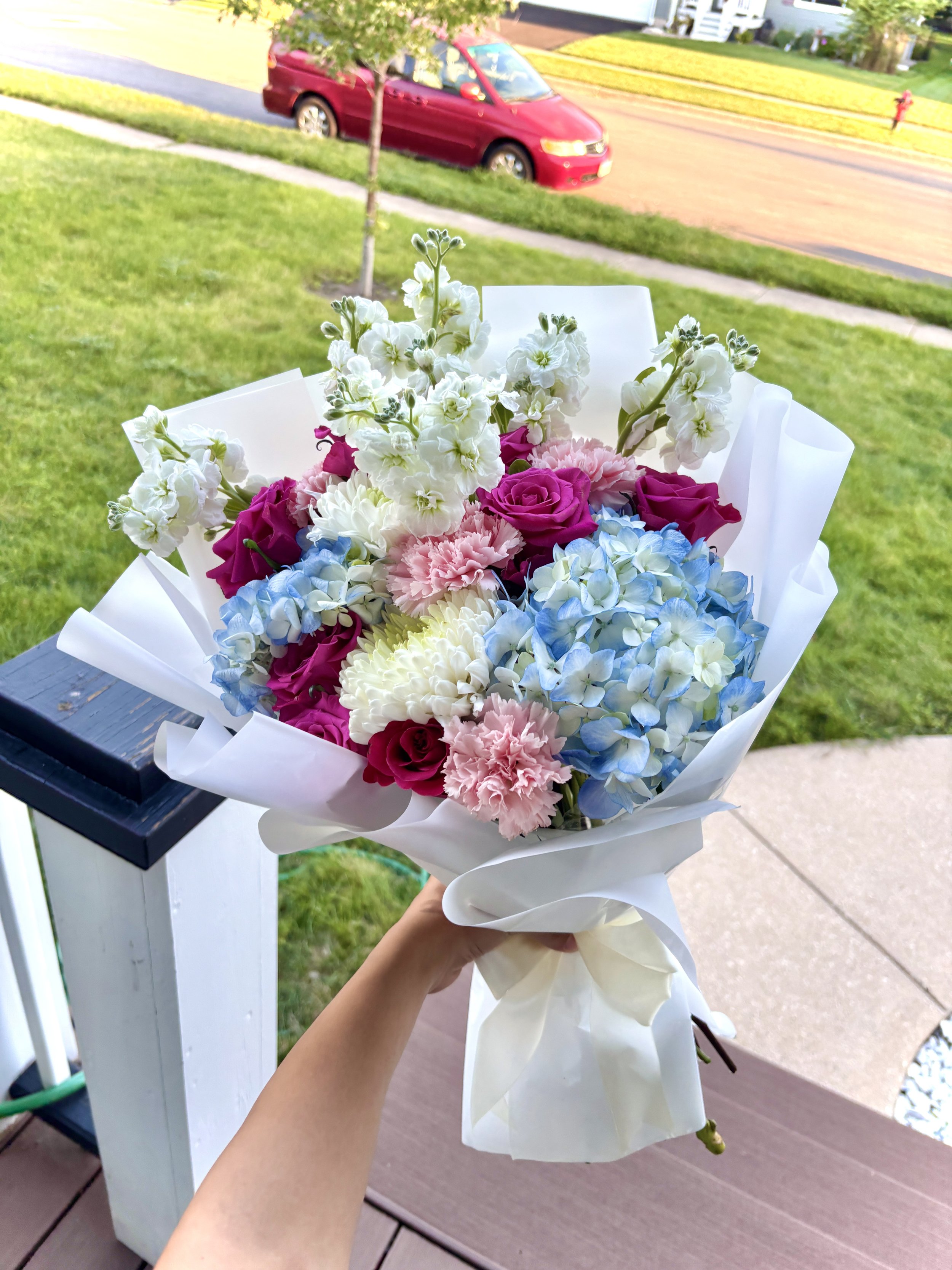 12 Roses + 4 Filler $50