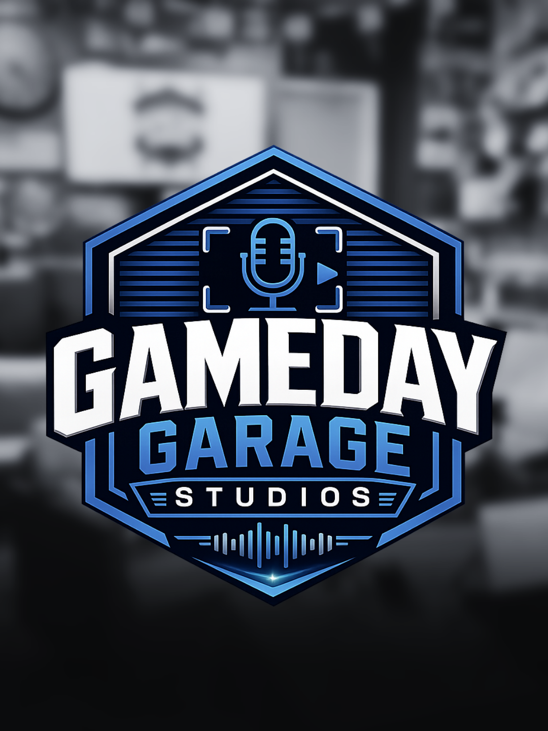 Logo for Gameday Garage Studios with a shield shape, microphone icon, and sound wave graphics, in blue tones.