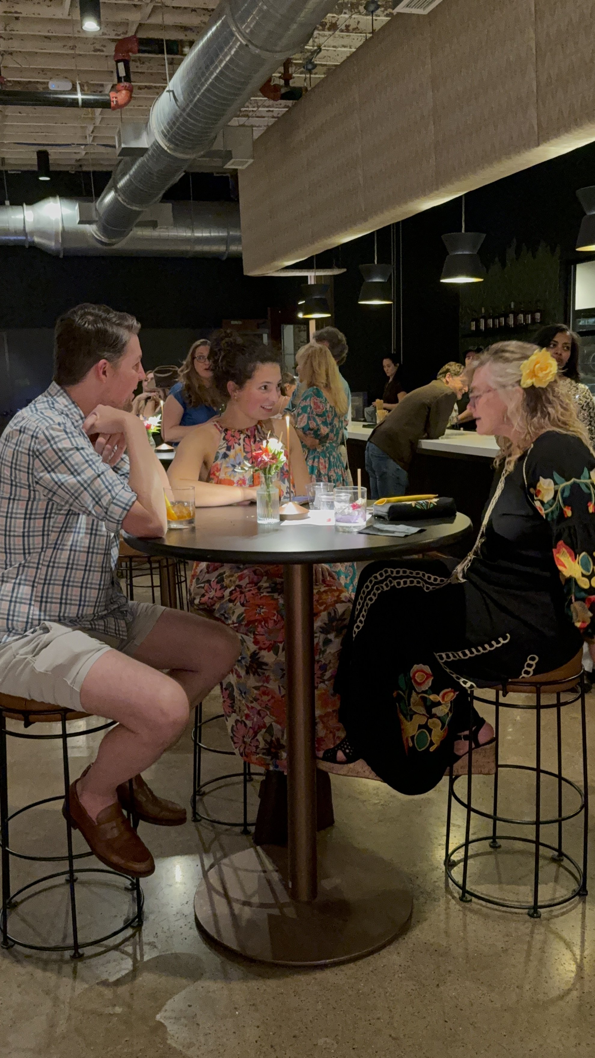Guests mingling by the bar