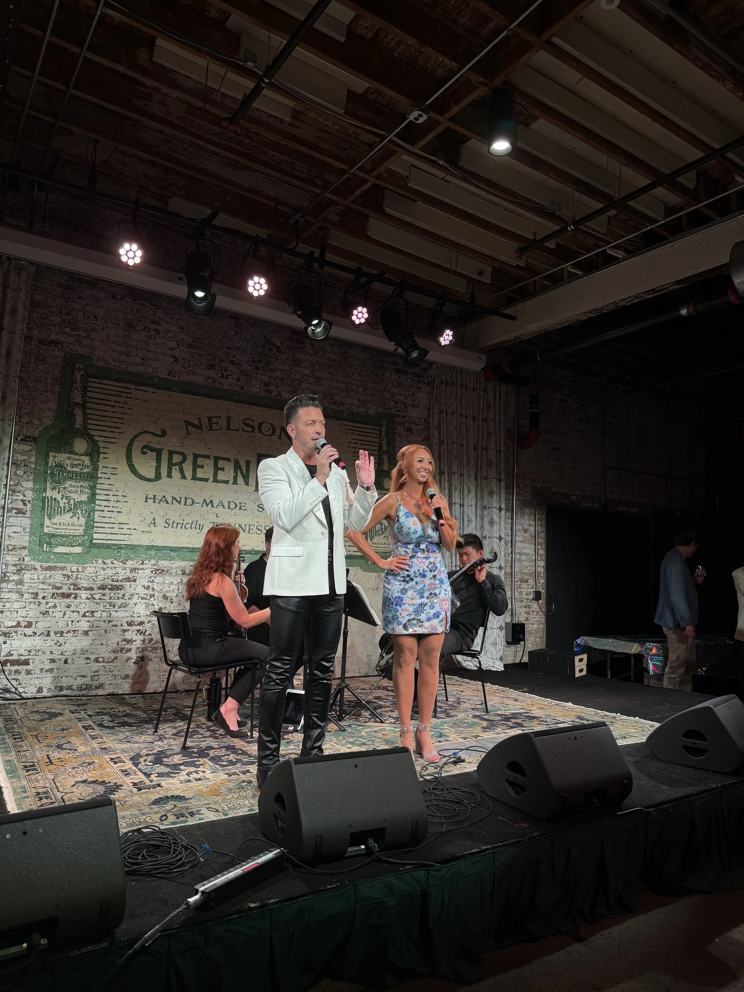 Co-emcees Becca Bowen and Daniel Musto 