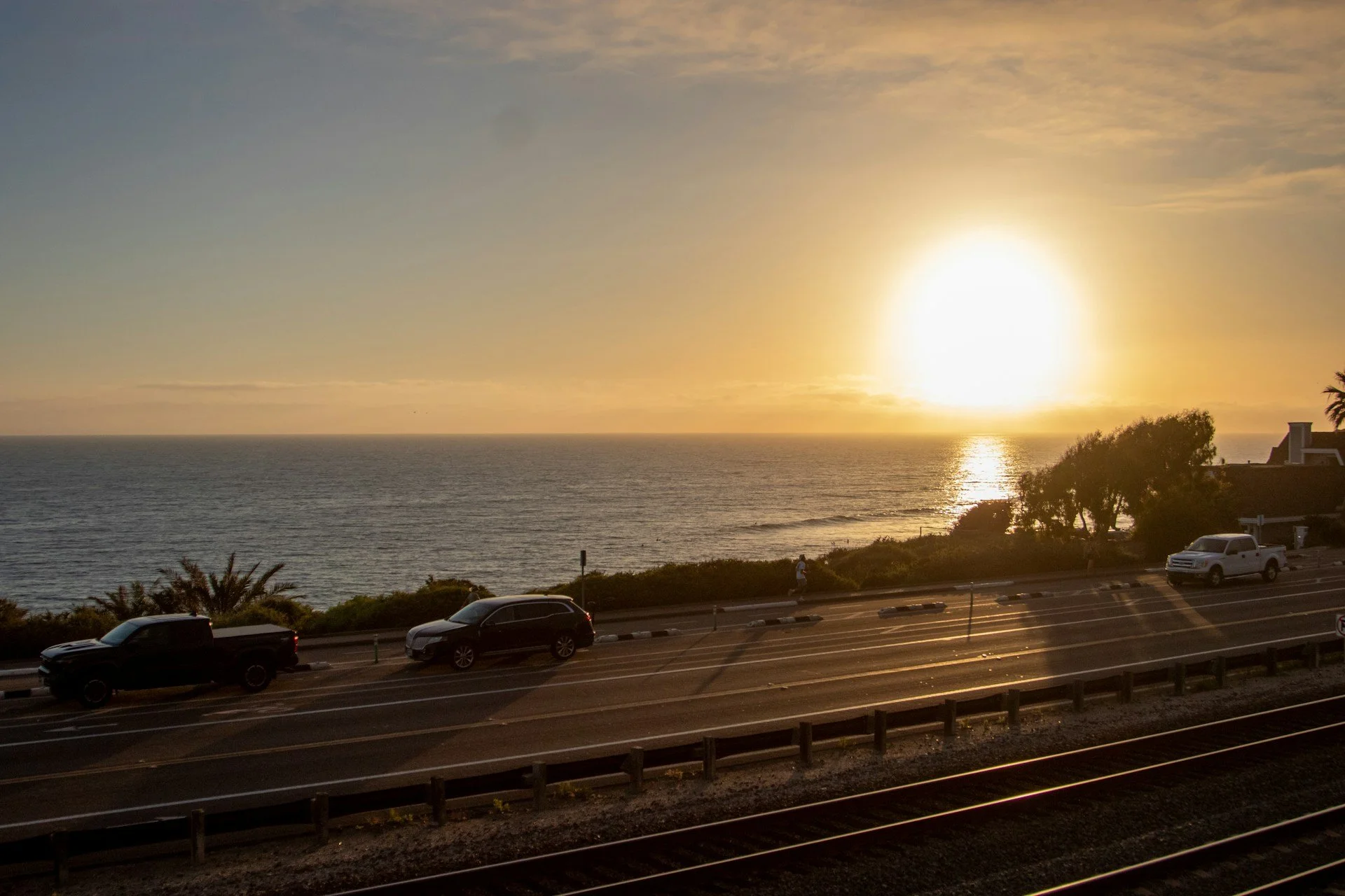 train tracks, PCH highway, ocean view and golden hour sunset in San Clemente, CA, Just Appraisals Inc.