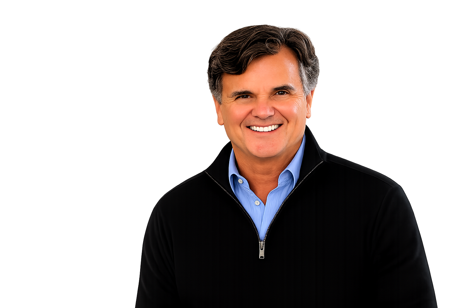 A smiling middle-aged man with dark hair and a blue dress shirt, wearing a black zip-up jacket, standing against a colorful, blurred background.