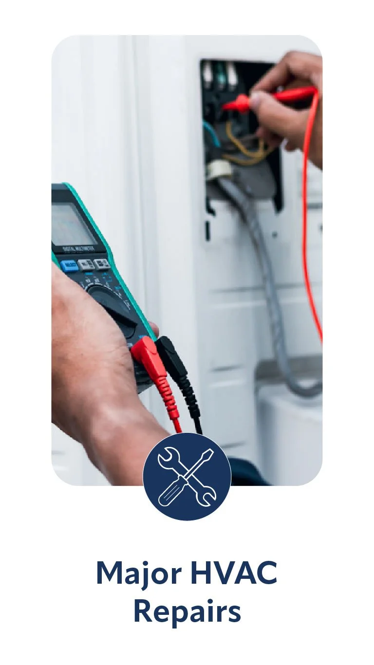 Technician testing HVAC electrical system with multimeter in a utility panel