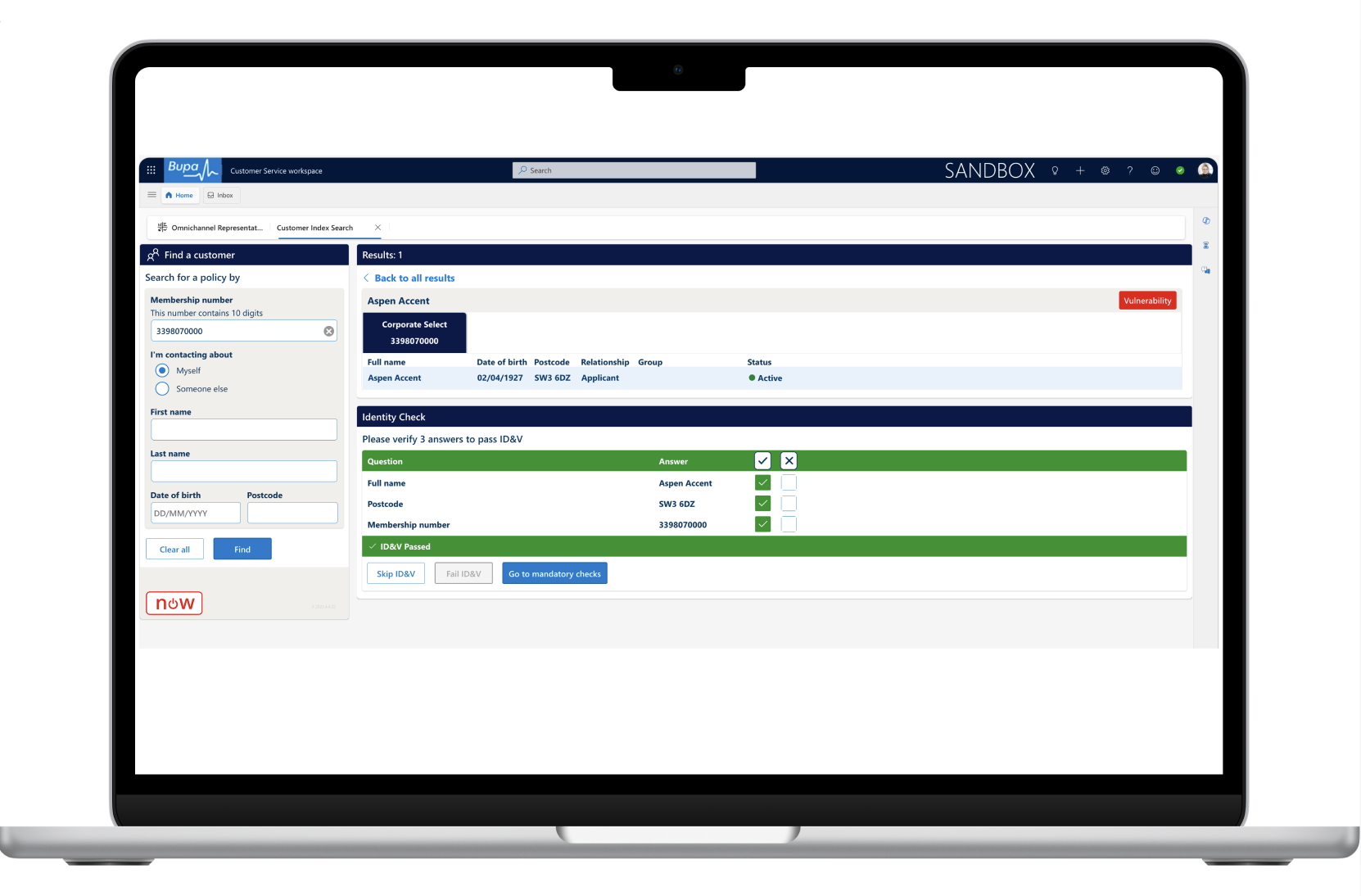 Laptop displaying a Bupa customer service workspace with customer details, ID verification, and a vulnerability alert.