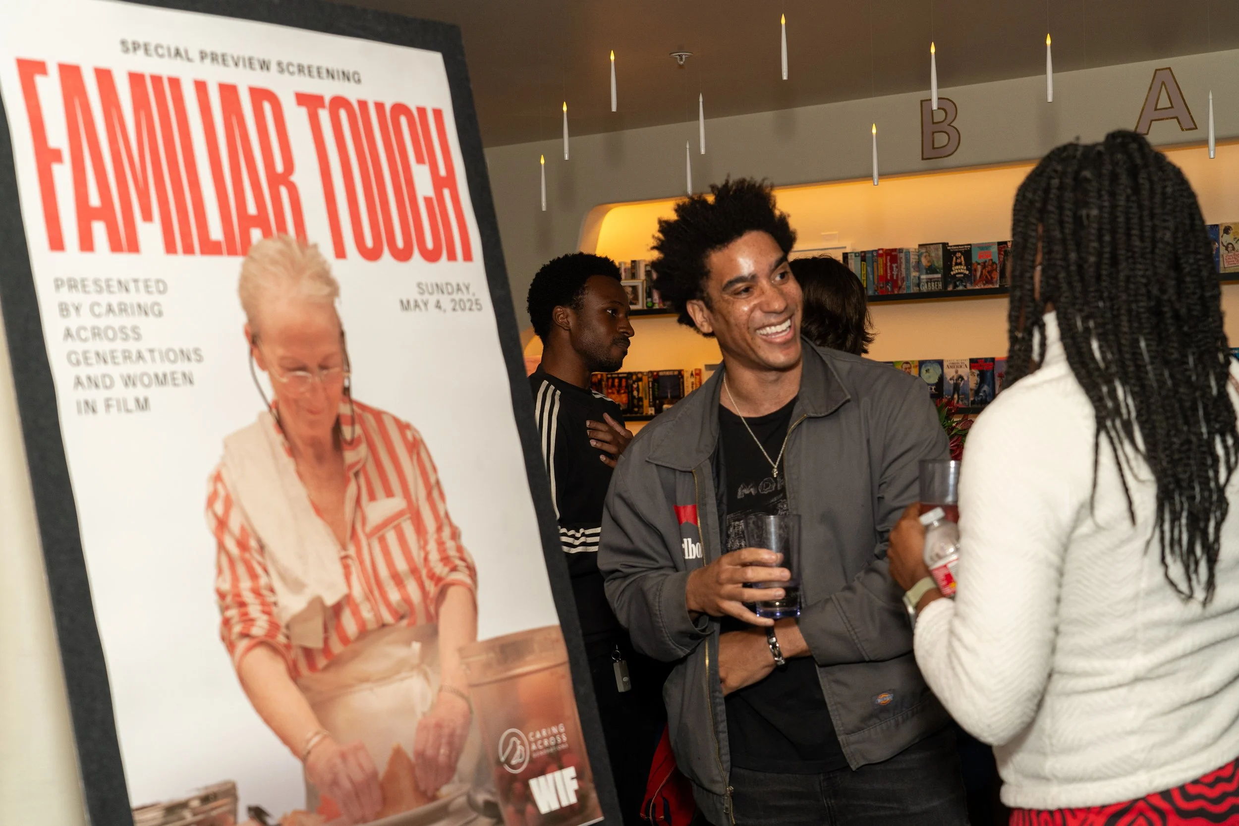  Guests mingling at the Familiar Touch special preview screening in Los Angeles, presented by Caring Across Generations and Women in Film, May 4, 2025. 