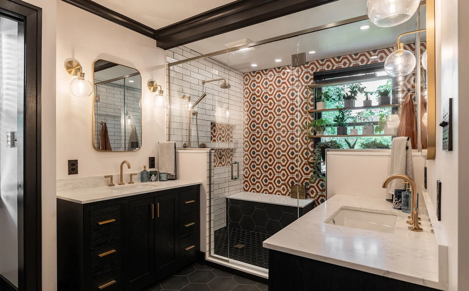 Modern and bold bathroom designed in black and white with a patterned tile