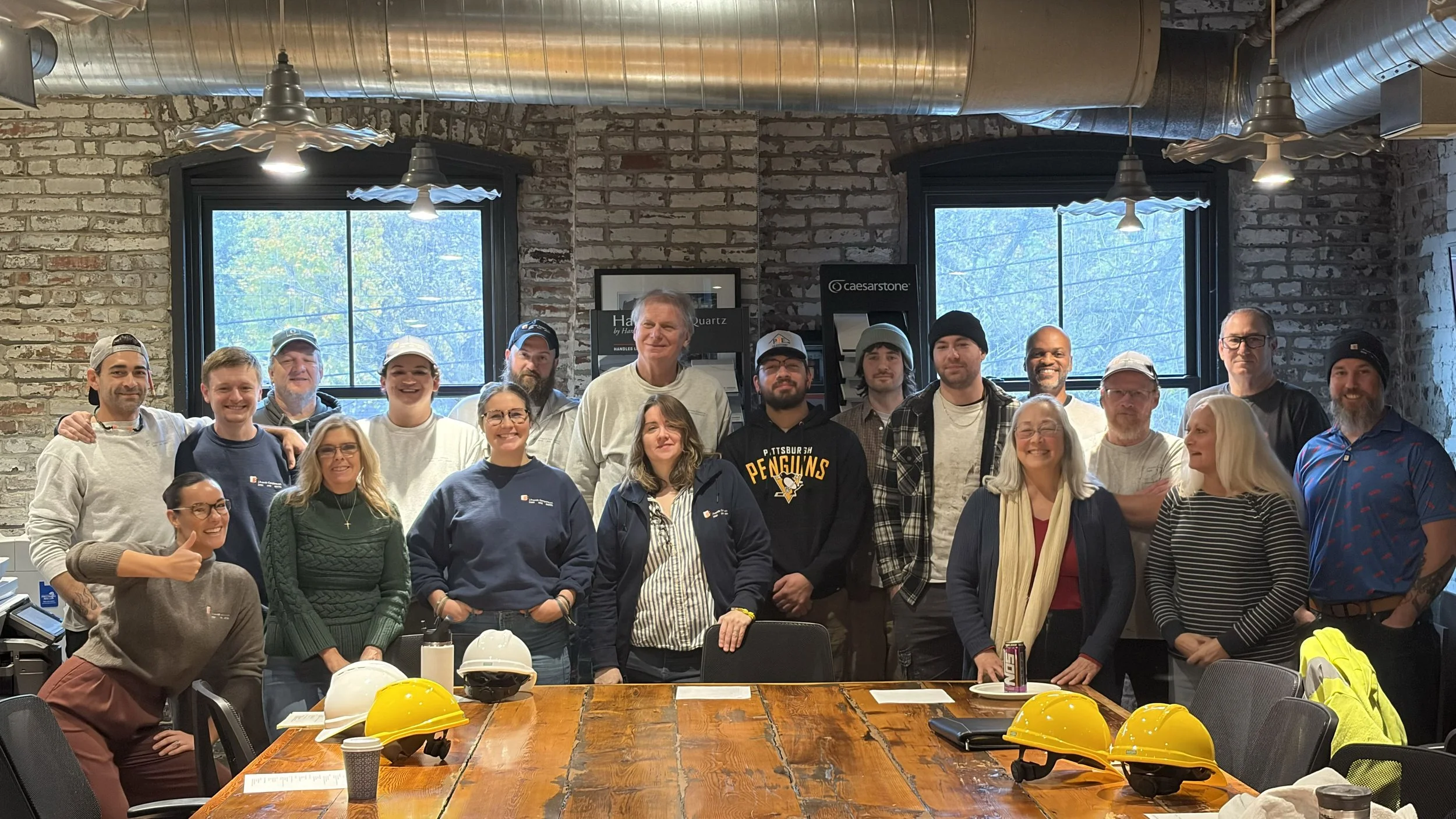 photo of a group of J. Francis employees in their headquarters
