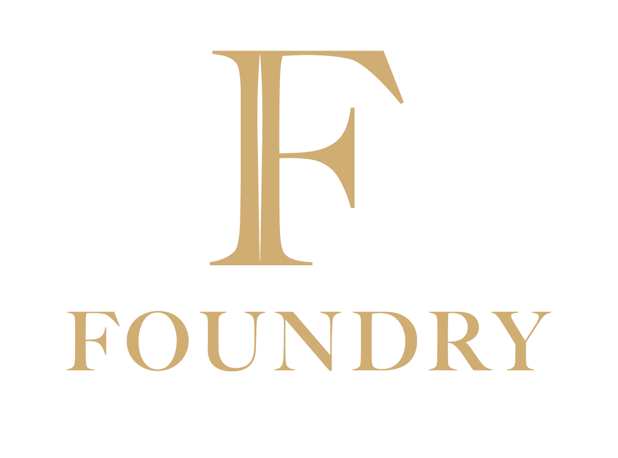 F Country Foundry Homes logo with a large letter F in beige color, and the words 'Foundry Homes' below, on a black background.
