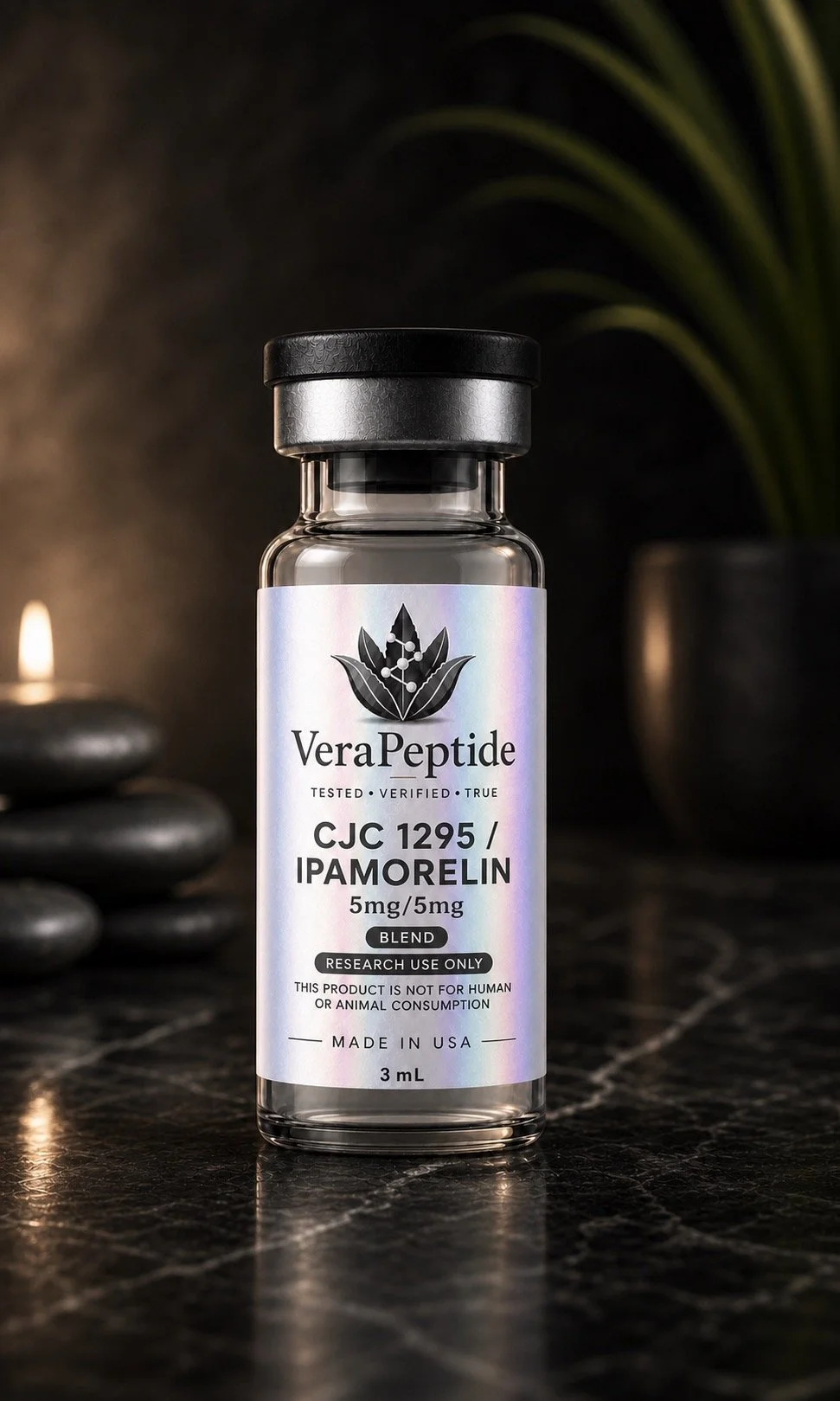 A small glass bottle with a black cap labeled VeraPeptide, containing a research-only supplement called CJC 1295 / Ipamorelin, with a dosage of 5mg/5mg, made in the USA, placed on a dark reflective surface with blurred stones and a plant in the background.