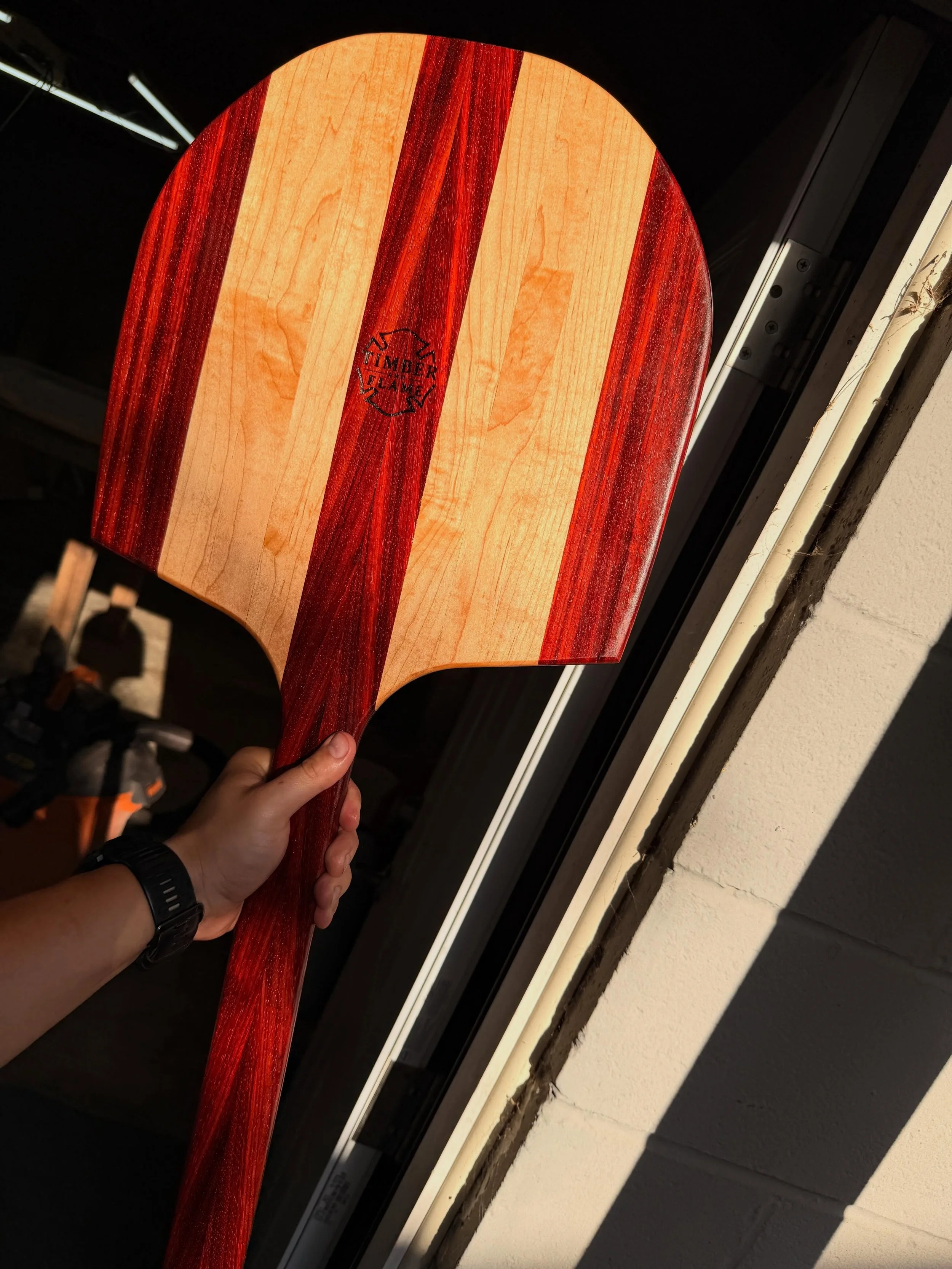 Who doesn&rsquo;t need a pizza peel? Get yours today from the website!

Made with Padauk and Hardened Maple 🪵🔥

#timberandflame #woodworking #woodcraft #pizzapeel #wood