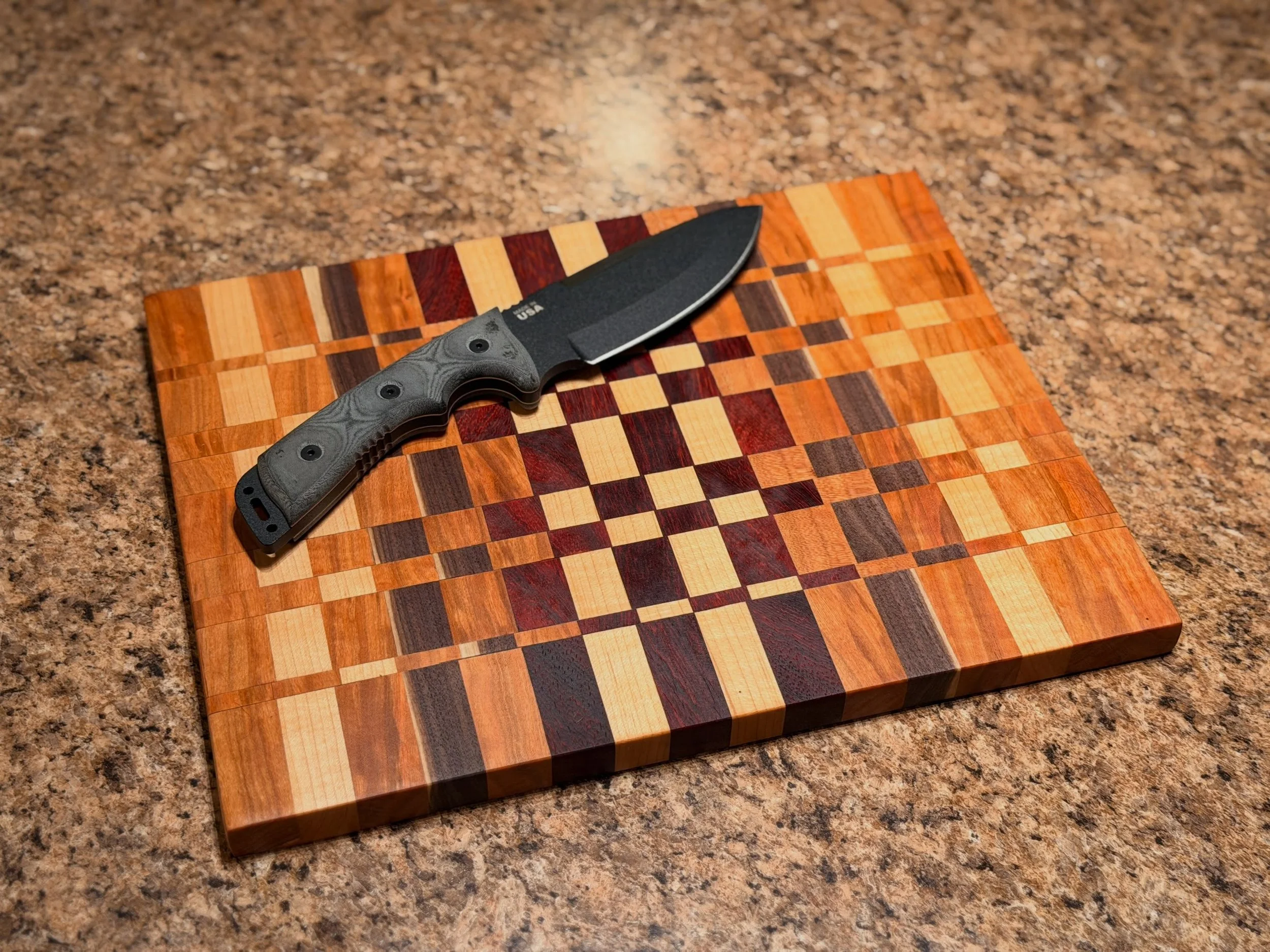 Two new pieces added to the shop! Link in the bio! Or shoot me a dm for local pickup!

Which one would you want to take home?!

A modern geometric cutting board made with Maple, Walnut, Padauk, and Cherry wood 🔥

A southern style, geometric pattern 
