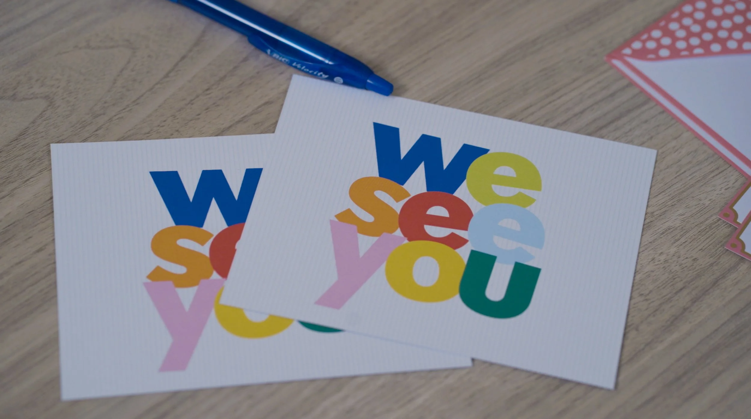 Colorful greeting cards with the words "we see you!"