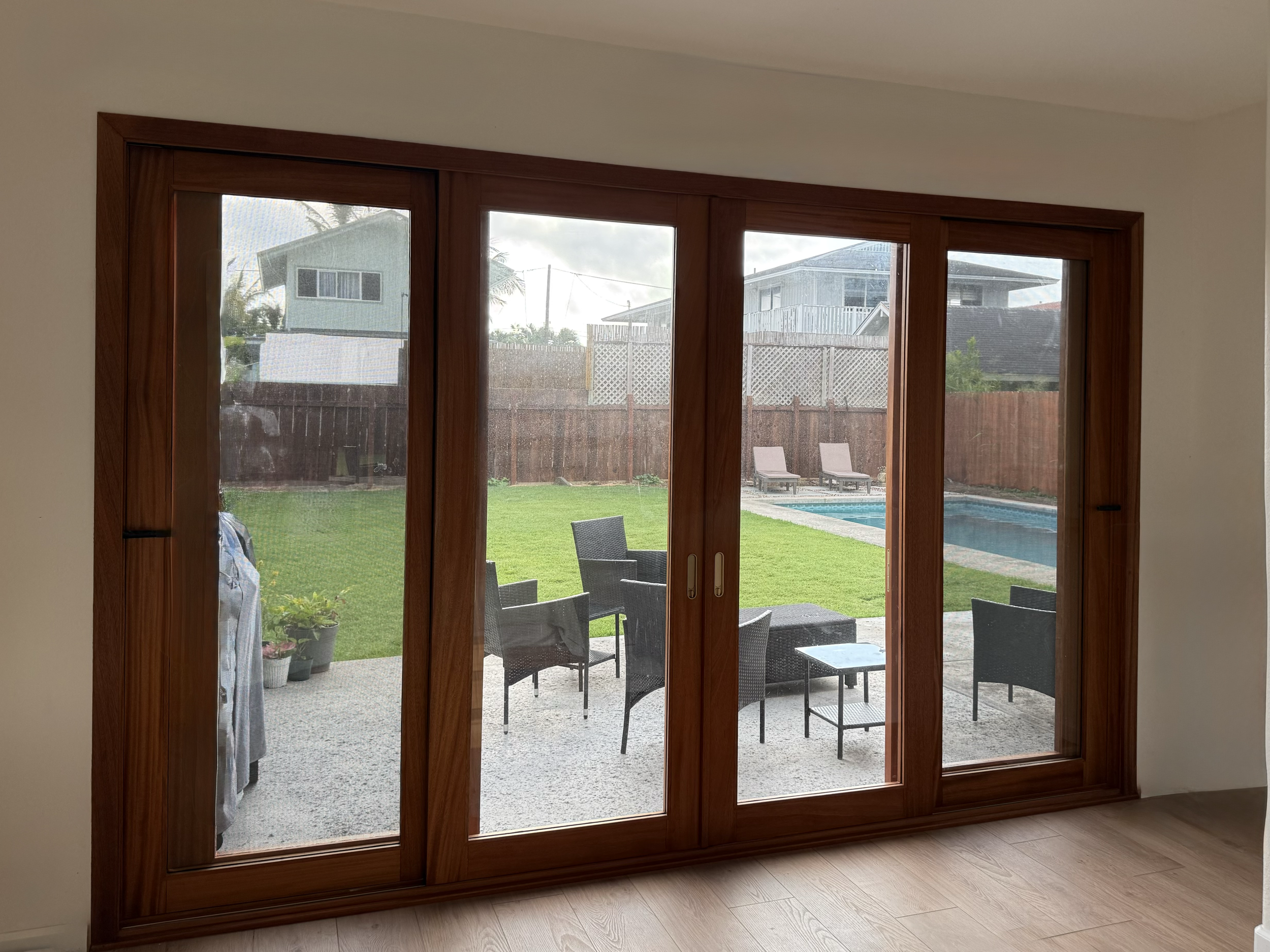 Custom African Mahogany Sliding Door System
Handcrafted from African Mahogany, this custom sliding door system combines rich natural wood grain with expansive glass panels to bring warmth, light, and a seamless connection between indoor and outdoor l