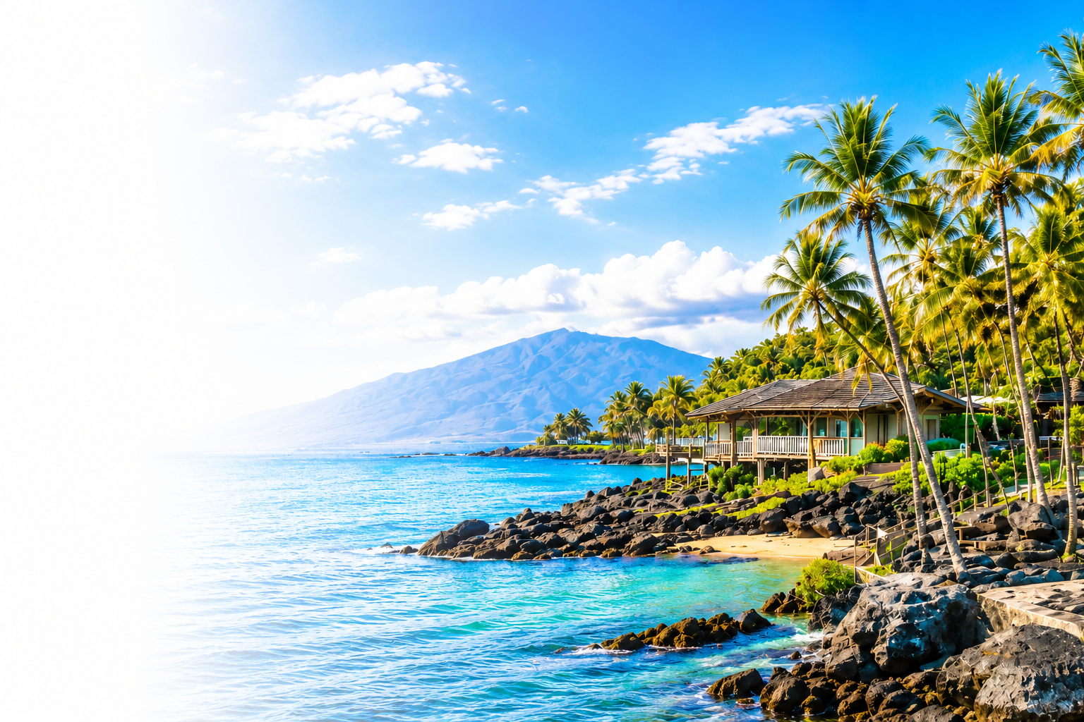Tropical beach scene with palm trees, rocks, a wooden house, blue ocean, and a mountain in the background under a partly cloudy sky.