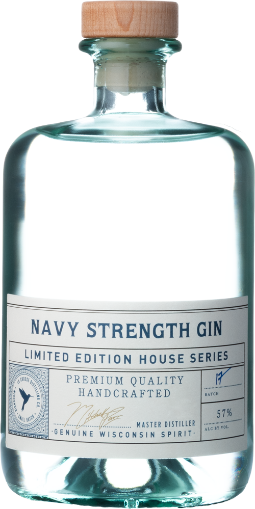 A clear glass bottle of Navy Strength Gin with a wooden cap, featuring a white label with blue and gold text.