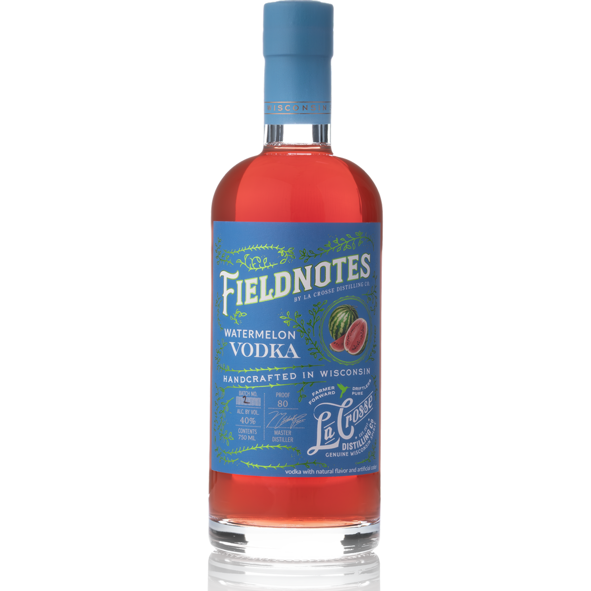 Bottle of Fieldnotes Watermelon Vodka with a blue label and cap, showing a watermelon illustration and text about the vodka.