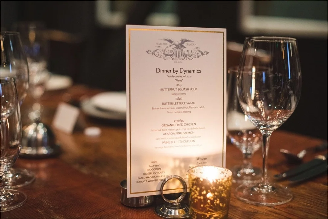 A table card about the Dinner by Dynamics event held at Wayfare Tavern in San Francisco in early 2020.