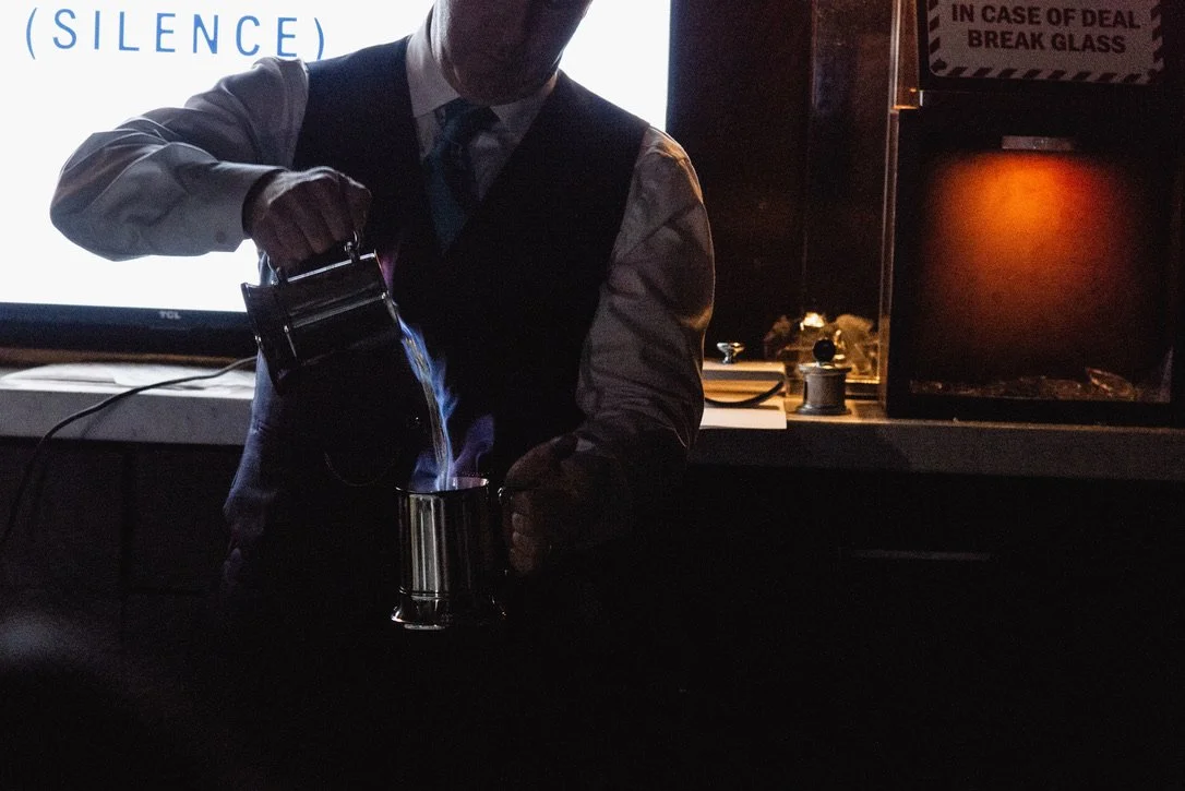 Making a Blue Blazer flaming cocktail