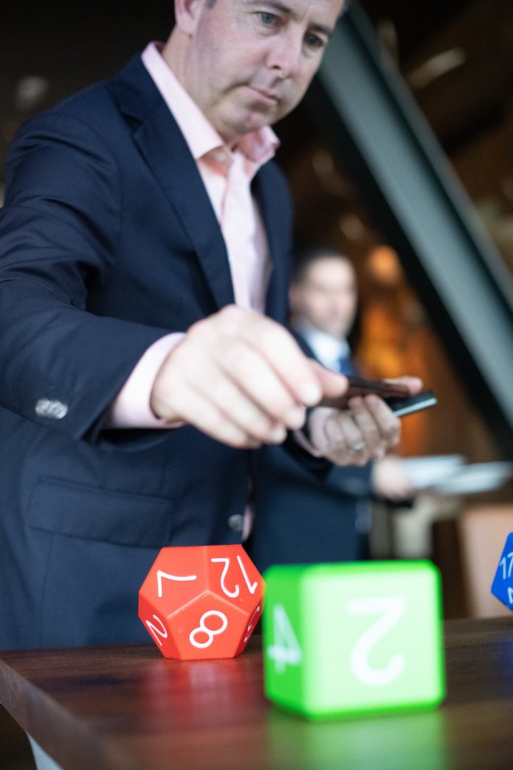 I have been called "The Carrot Top of B2B" for my penchant for props. In this case, giant foam dice used for an interactive game about odds and probabilities.