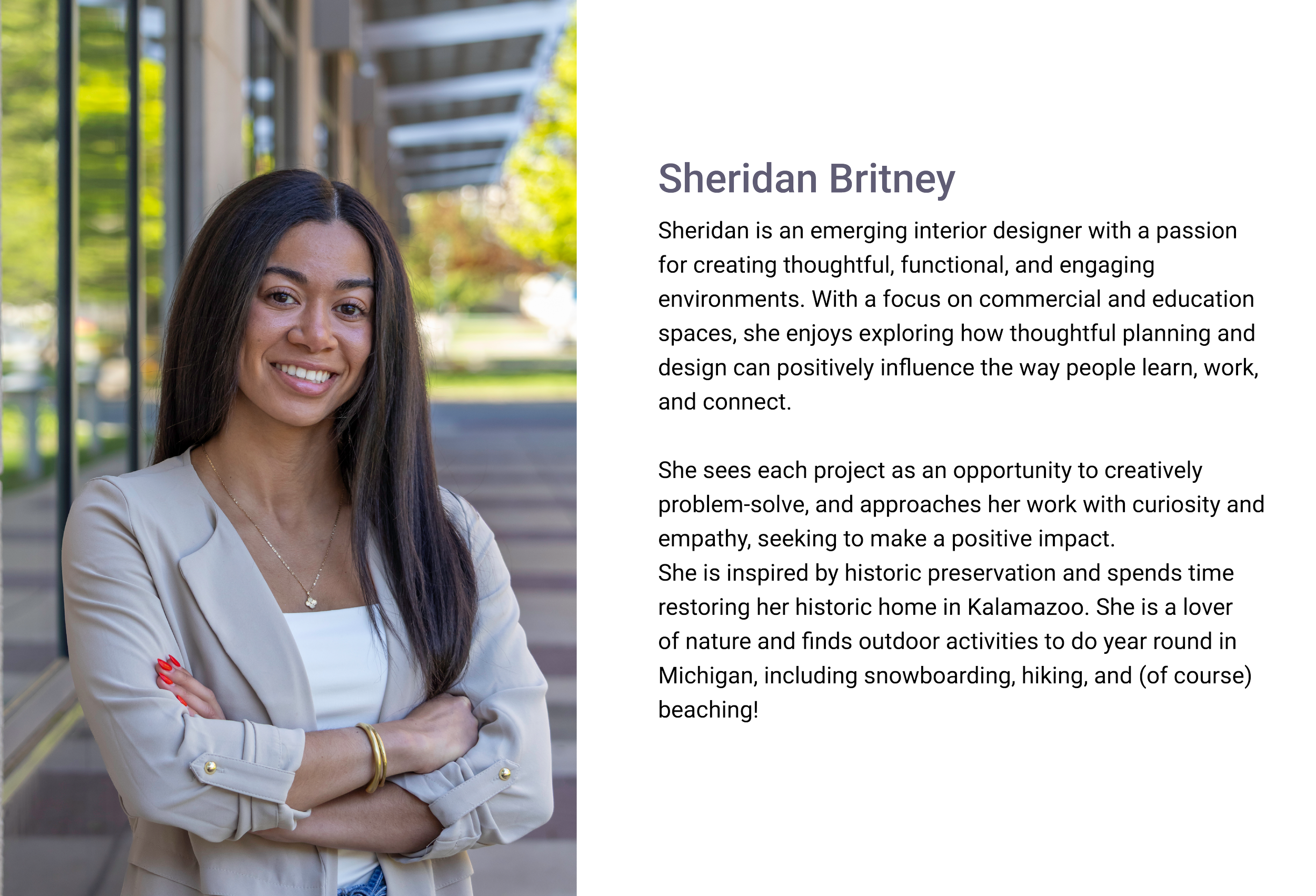 Sheridan Britney, Interior Designer of E.H. Goodman Architects. A young woman with long dark hair, smiling, standing outdoors near a building with large glass windows and green trees in the background.
