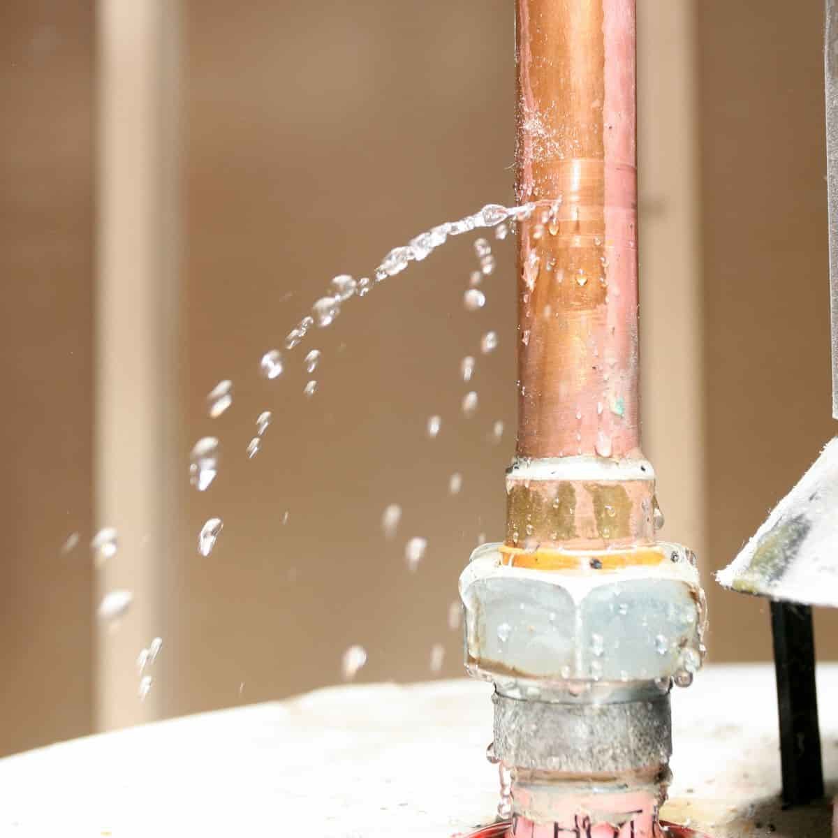 water jetting our of a copper pipe