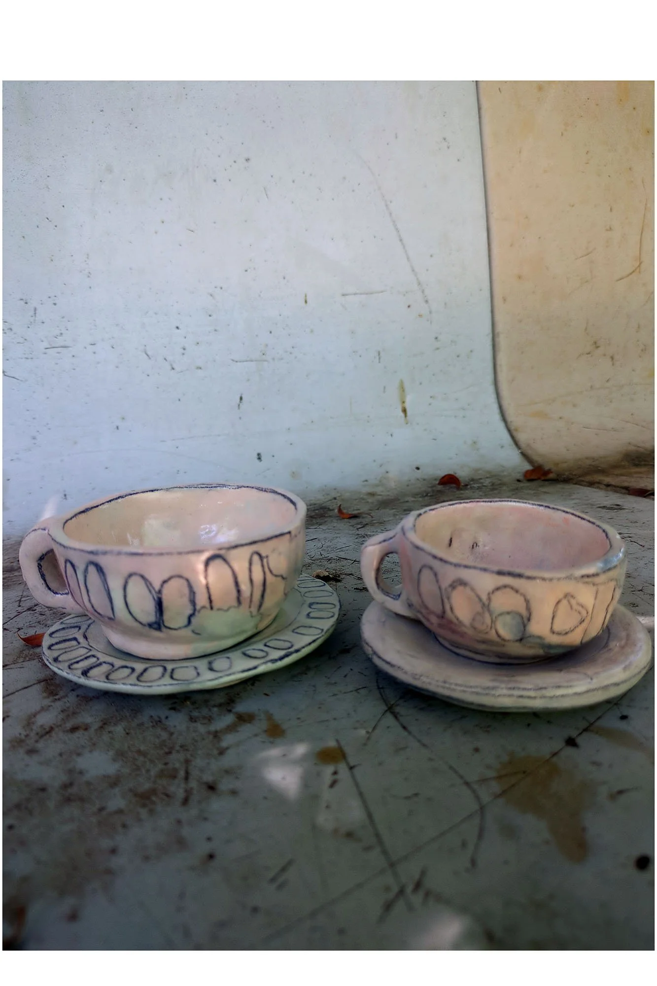 Johanna Jackson--set of two cups and saucers for people drinking different drinks, together