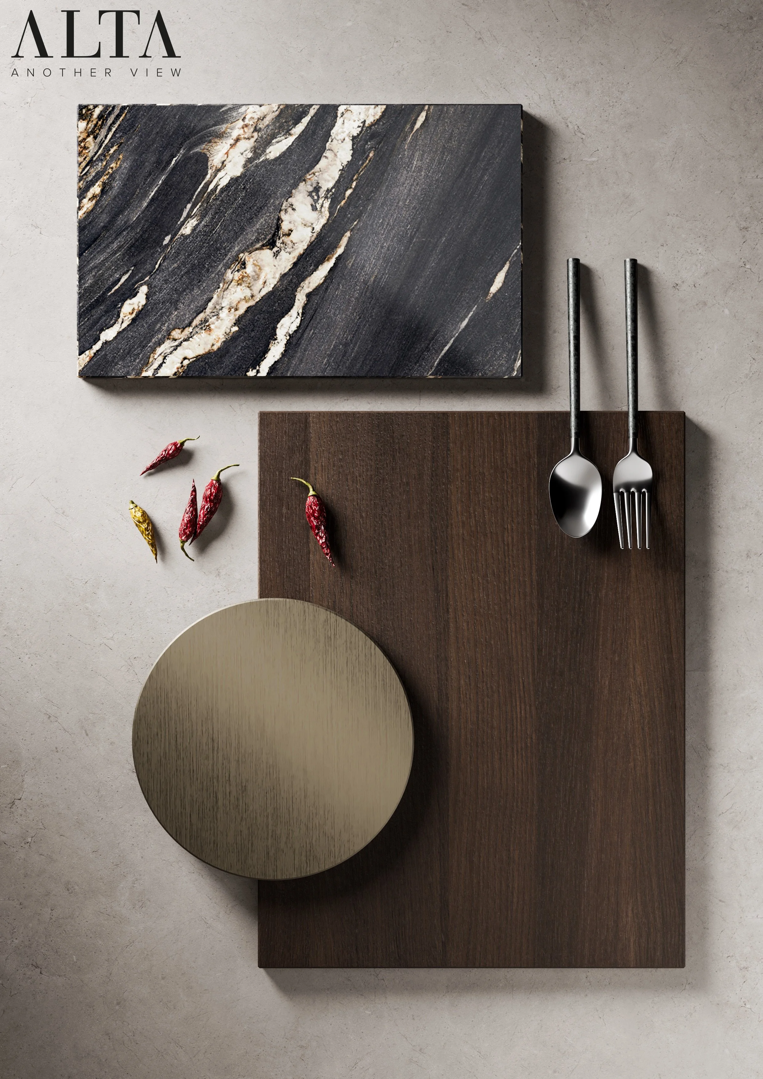 A flat lay of modern interior design items including a large black marble tile, a dark wood board, a round metallic-colored table, and two metal utensils, with a few dried chili peppers scattered around.