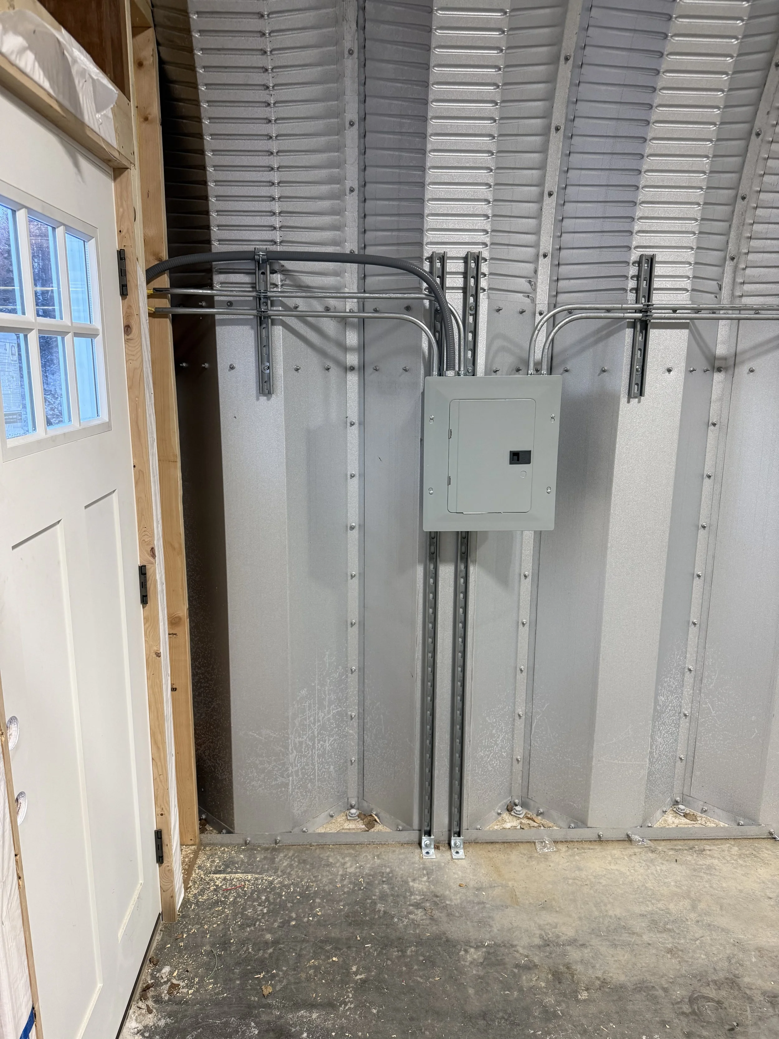 Electrical panel installation during commercial construction