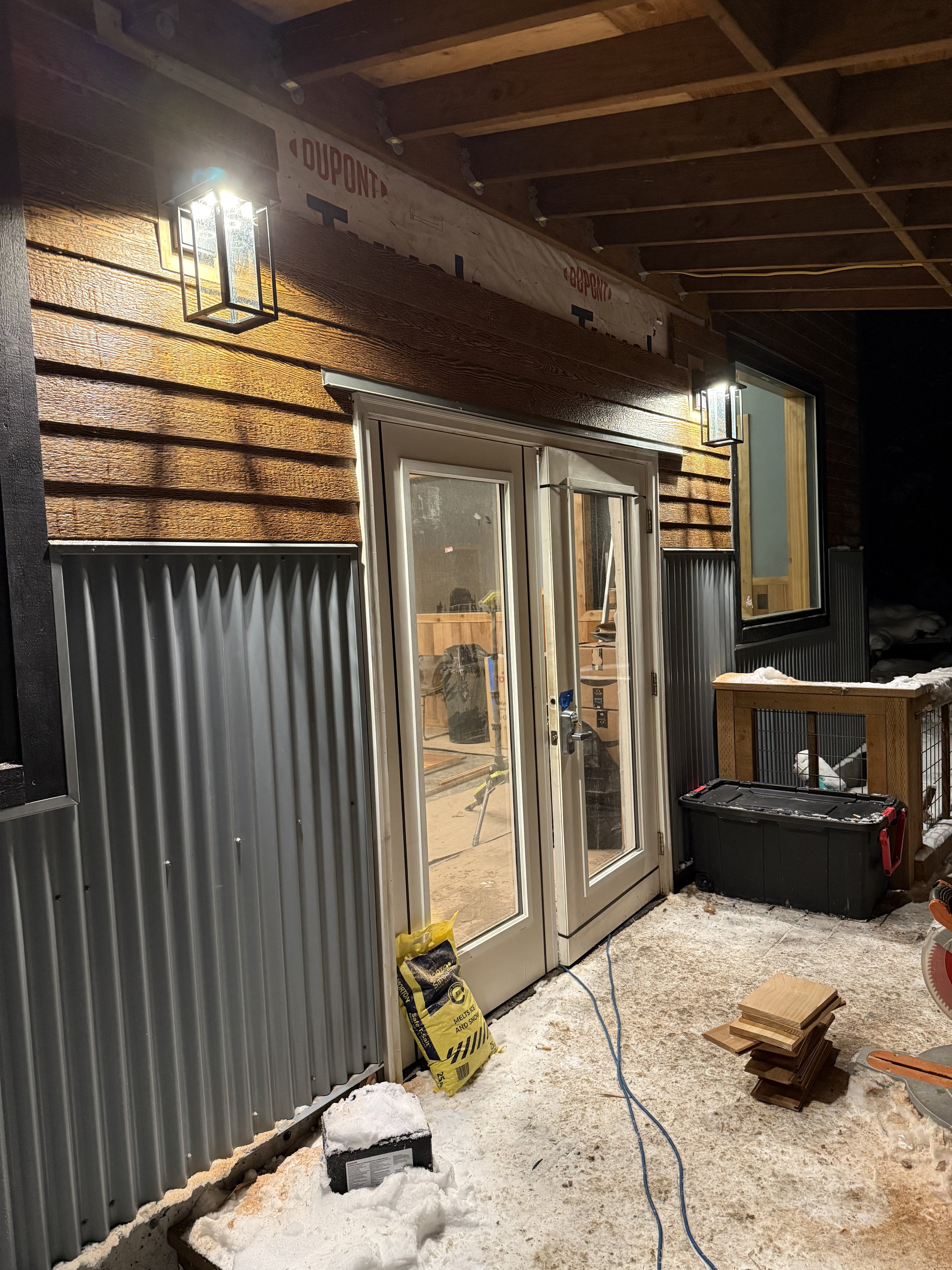 Exterior wall lighting installation on residential remodel