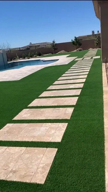 Quality hardscape design and construction for a modern and clean design pathway in Arizona backyards for landscape services.
