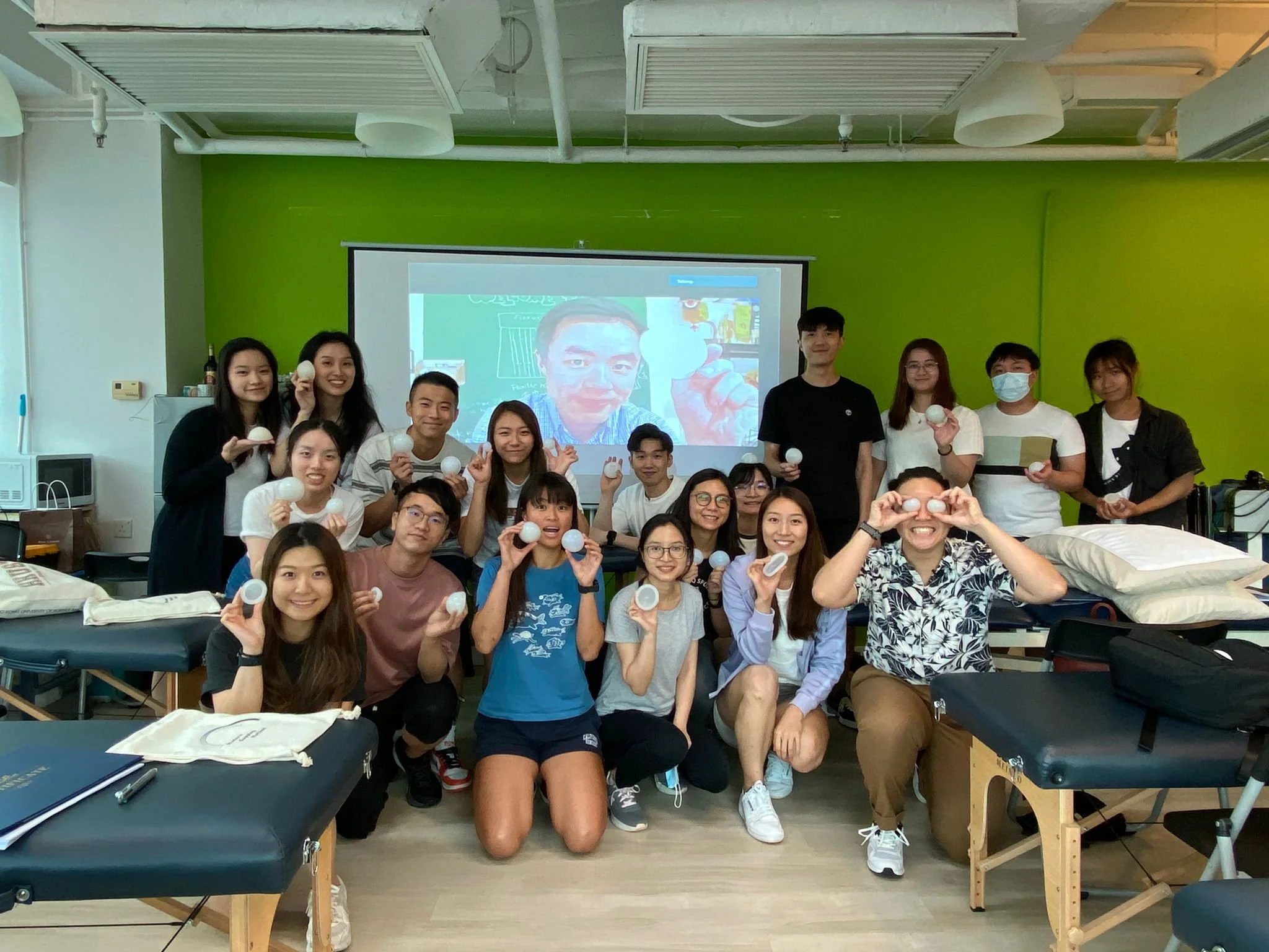 A group of photo of physios after joining Physio Kenny Yu's fascial mobilisation workshop since 2016. This photo took in 2022 and its the second workshop of the year means its well-known for the skills that physical therapists learned was great.