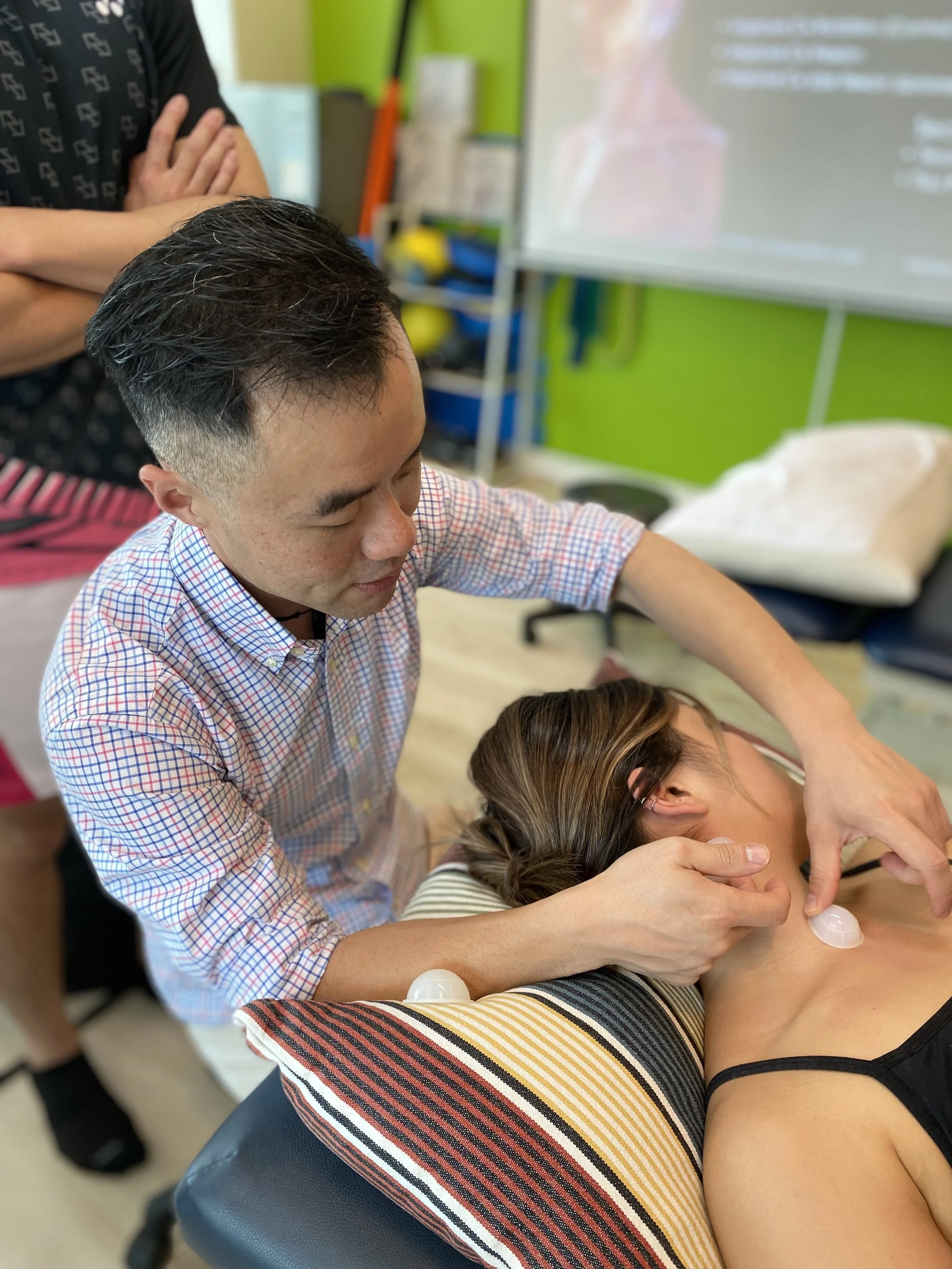 New Zealand based Hong Kong physio Kenny Yu who is the founder of modern cupping method and fascial mobilisation therapy demonstrate a soft tissue mobilisation treatment by using small silicon cups to decrease cervical neck tension in workshop.