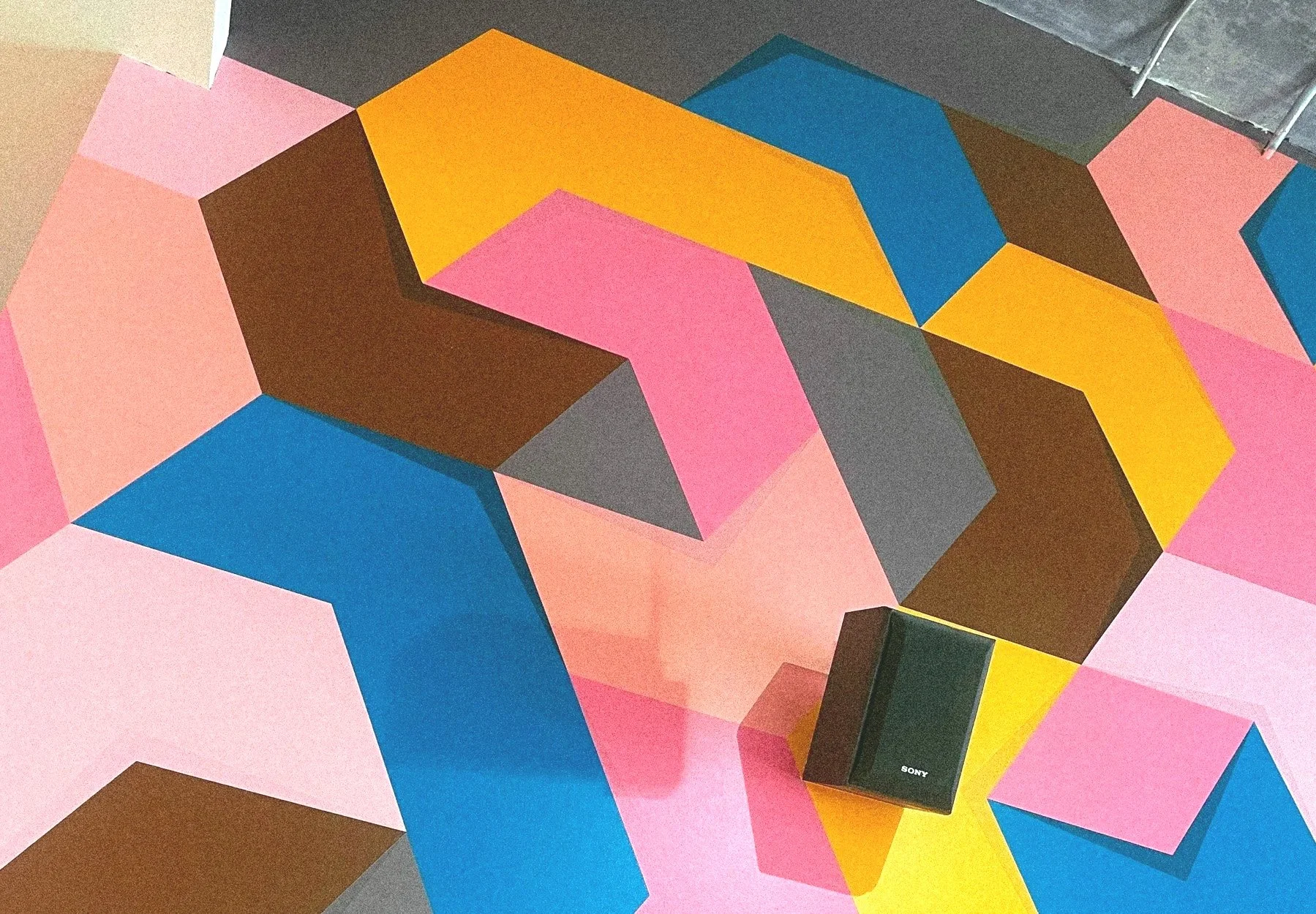 Colorful geometric interior mural by Andrew Haan for Philz Coffee in Downtown Los Angeles, California