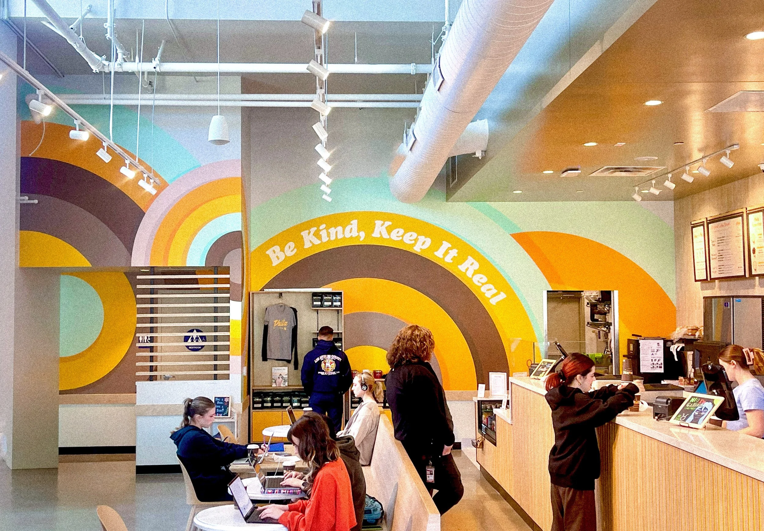 Philz Coffee Calabasas interior featuring a colorful custom mural by Andrew Haan