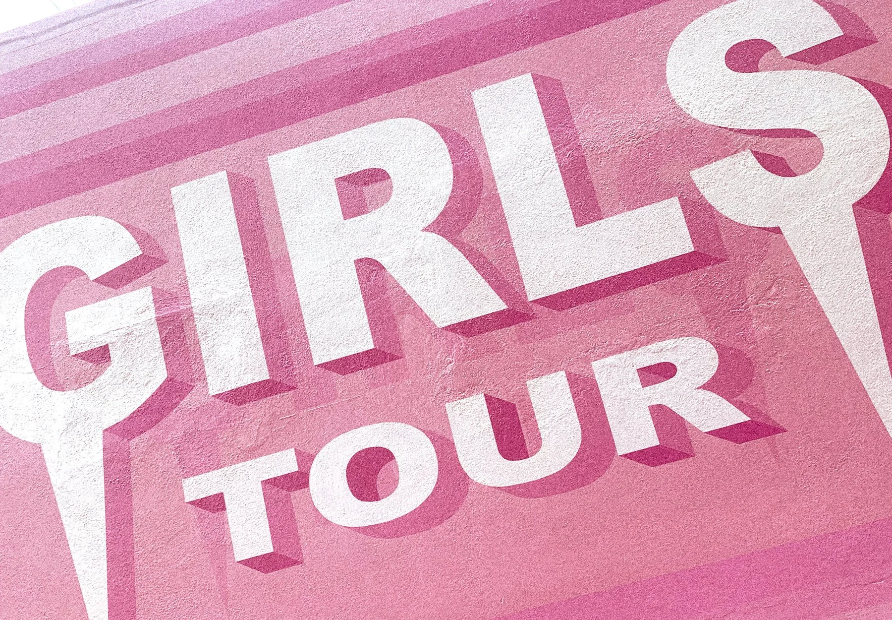 Pink typographic mural created by Andrew Haan for Girls Trip in Los Angeles, California