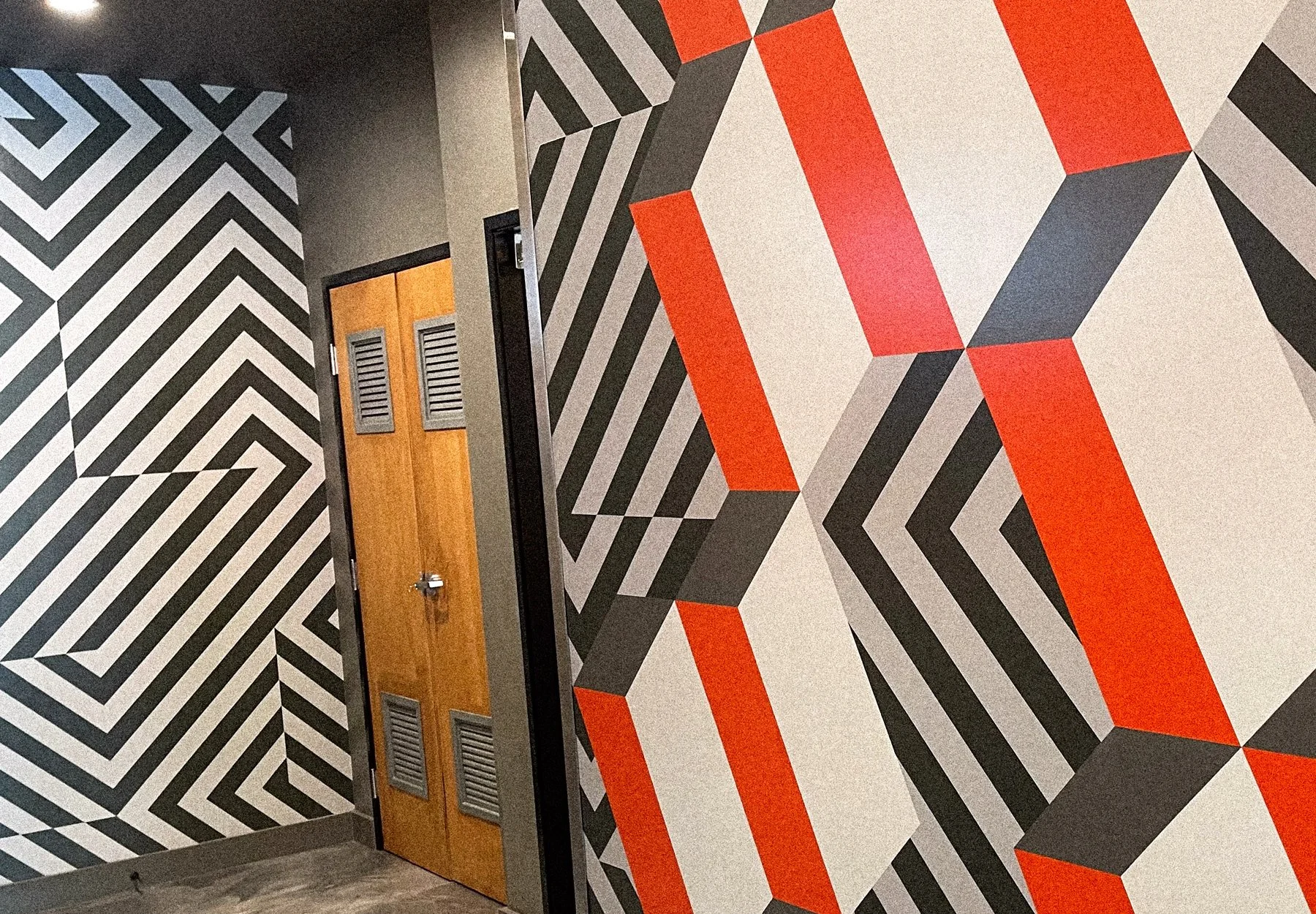 Black, white, and red geometric interior mural by Andrew Haan for Carmelita’s Restaurant in Dana Point, California