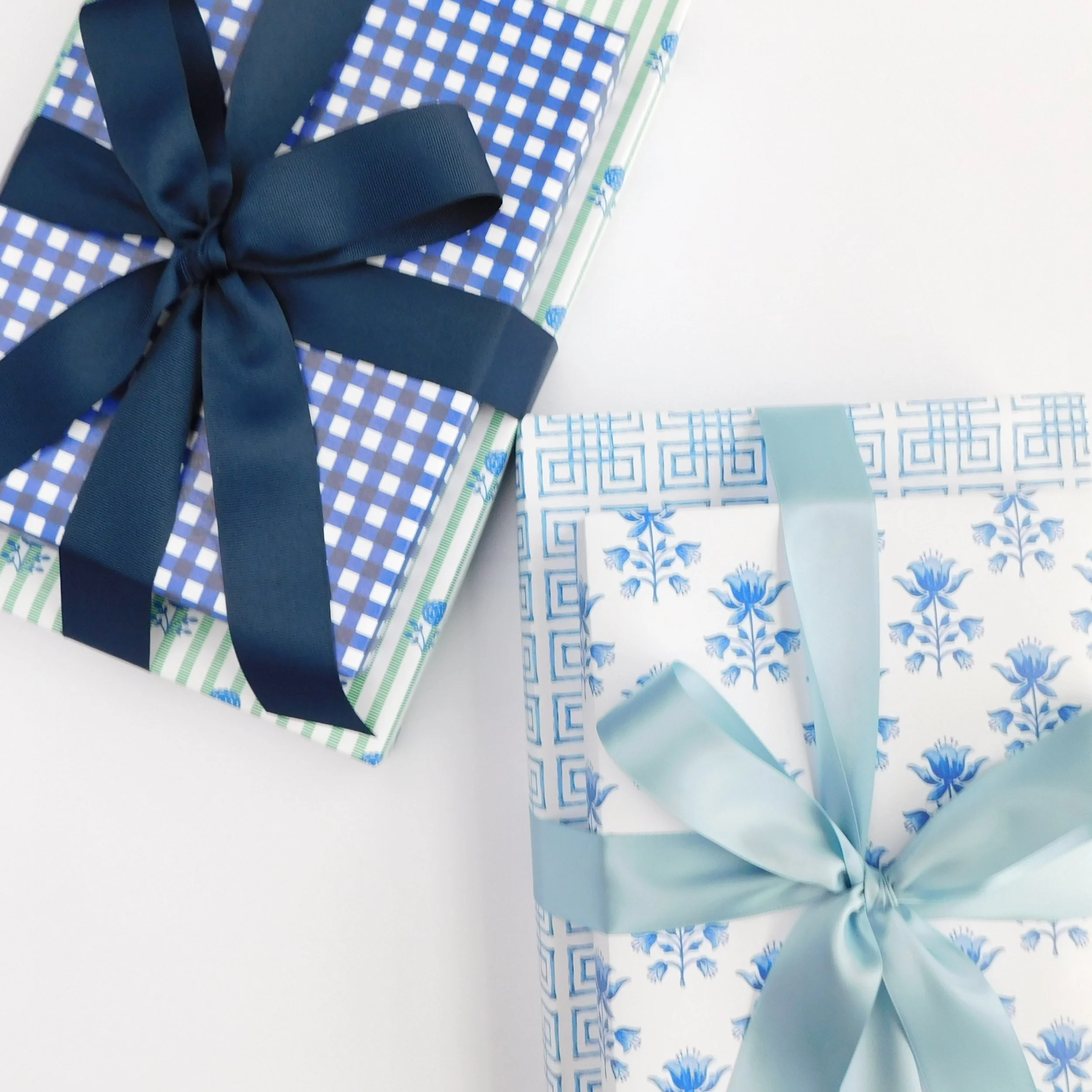 Same palette, four different moods. 💙💚

Gingham, geometric prints, and delicate florals, all playing in the same color family without ever feeling repetitive. It&rsquo;s proof that a cohesive palette doesn&rsquo;t mean every gift has to look the sa