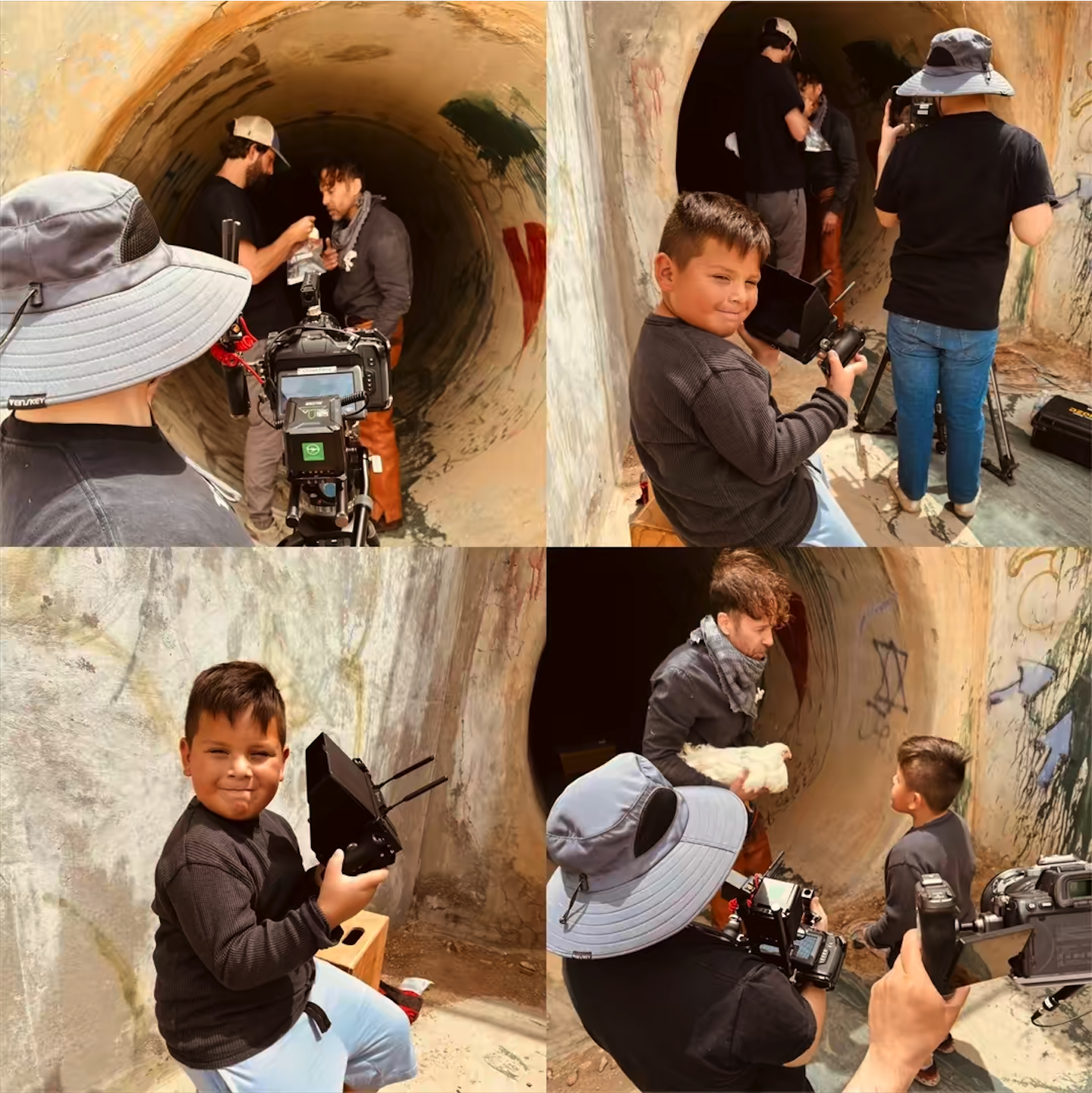 Young boy and adults filming and taking pictures inside a graffiti-covered tunnel.
