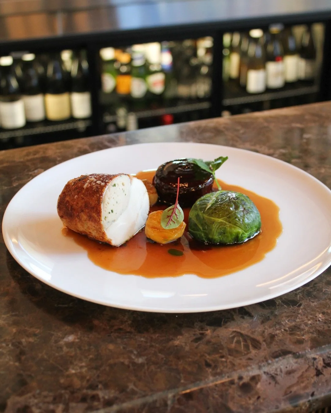 The newest addition to our autumn menu, Le poulet r&ocirc;ti is comfort and craftsmanship on a plate.

Roasted free-range chicken with chestnut mousse, confit legs, choux-farci, port-braised kohlrabi and roasted chestnut sauce - thoughtfully composed