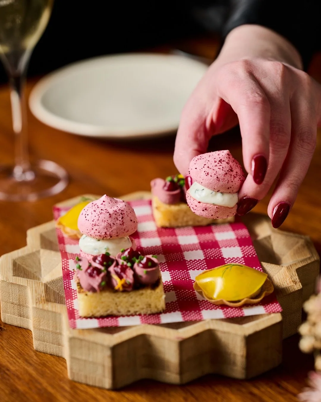 A memorable meal begins with the first bite. 

Le trio d&rsquo;amuse-bouche - three beautifully considered bites designed to awaken the palate and set the tone for what&rsquo;s to come.

Goat&rsquo;s cheese boursin with saffron macaron, smoked trout 
