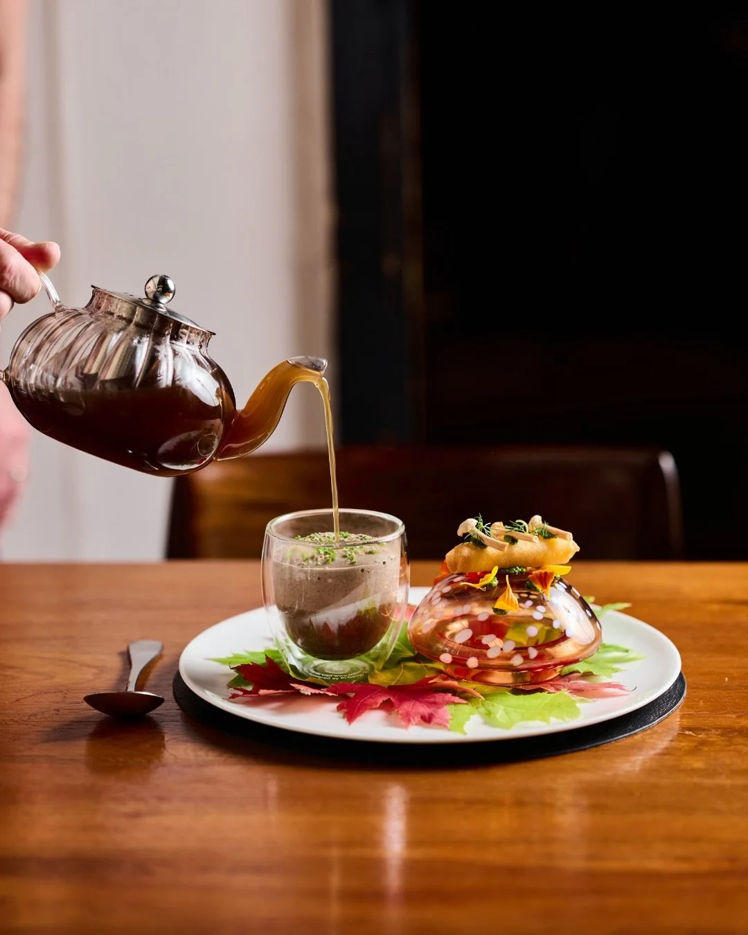 Comfort in its most refined form. 

Le cappuccino de champignons - delicate mushroom consomm&eacute; poured over velvety mushroom foam, accompanied by a Comt&eacute;-filled beignet and parsley pur&eacute;e.

Warm, earthy and quietly indulgent - the k