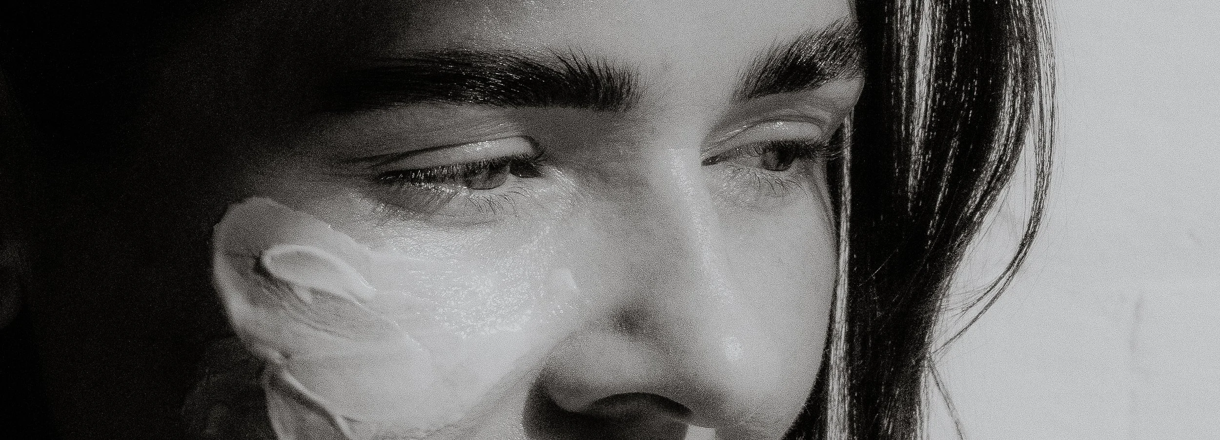 Close-up of natural skin texture, brows and lashes at KIN Skin Co Bath Lane Bendigo