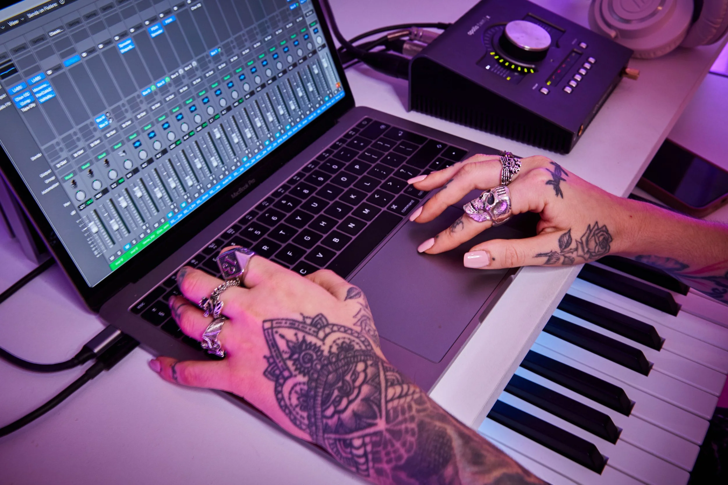 Woman's hands with tattoos engineering
