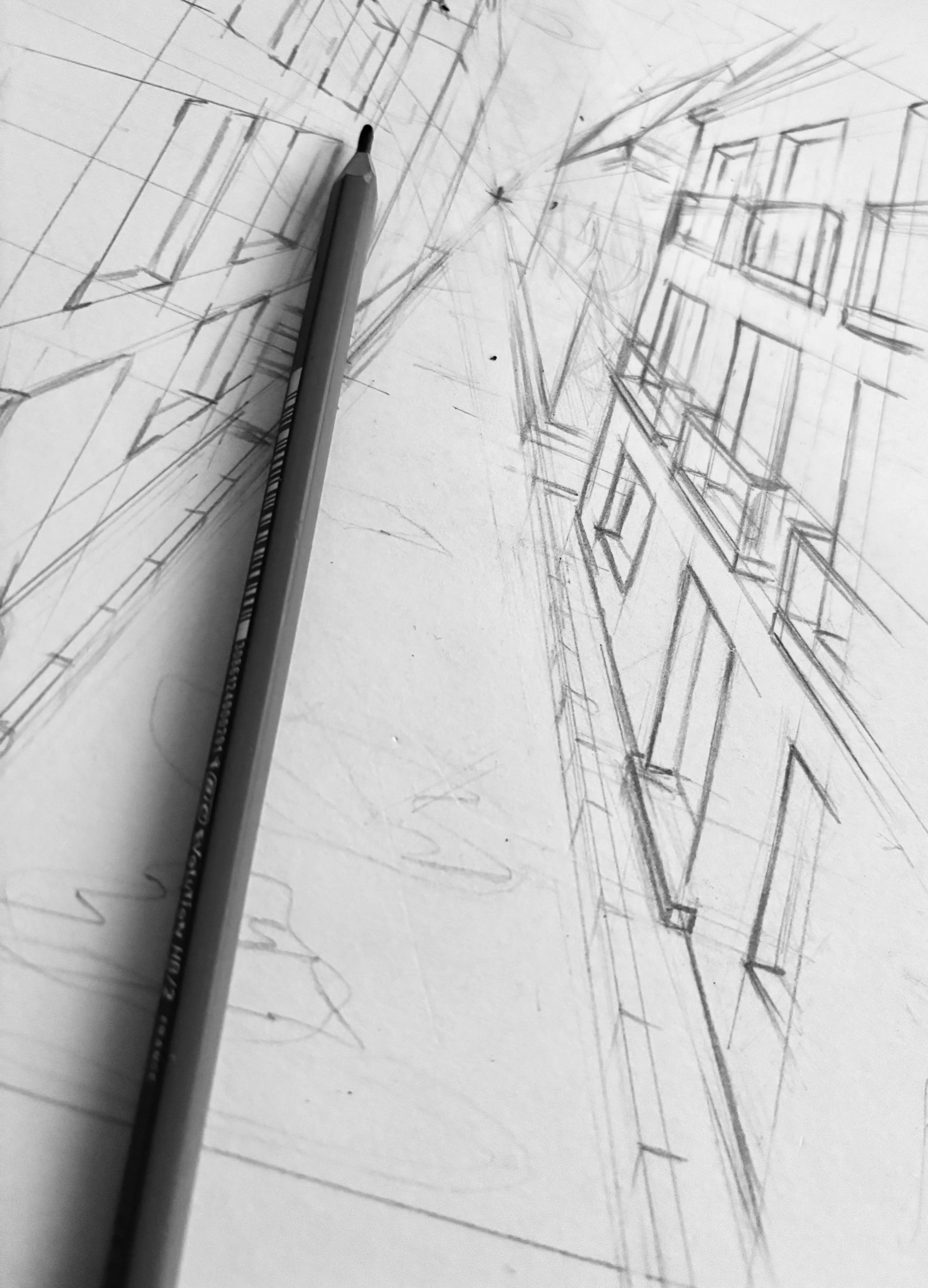 Pencils resting on architectural drawings — Design Review Audit for premium hospitality projects.