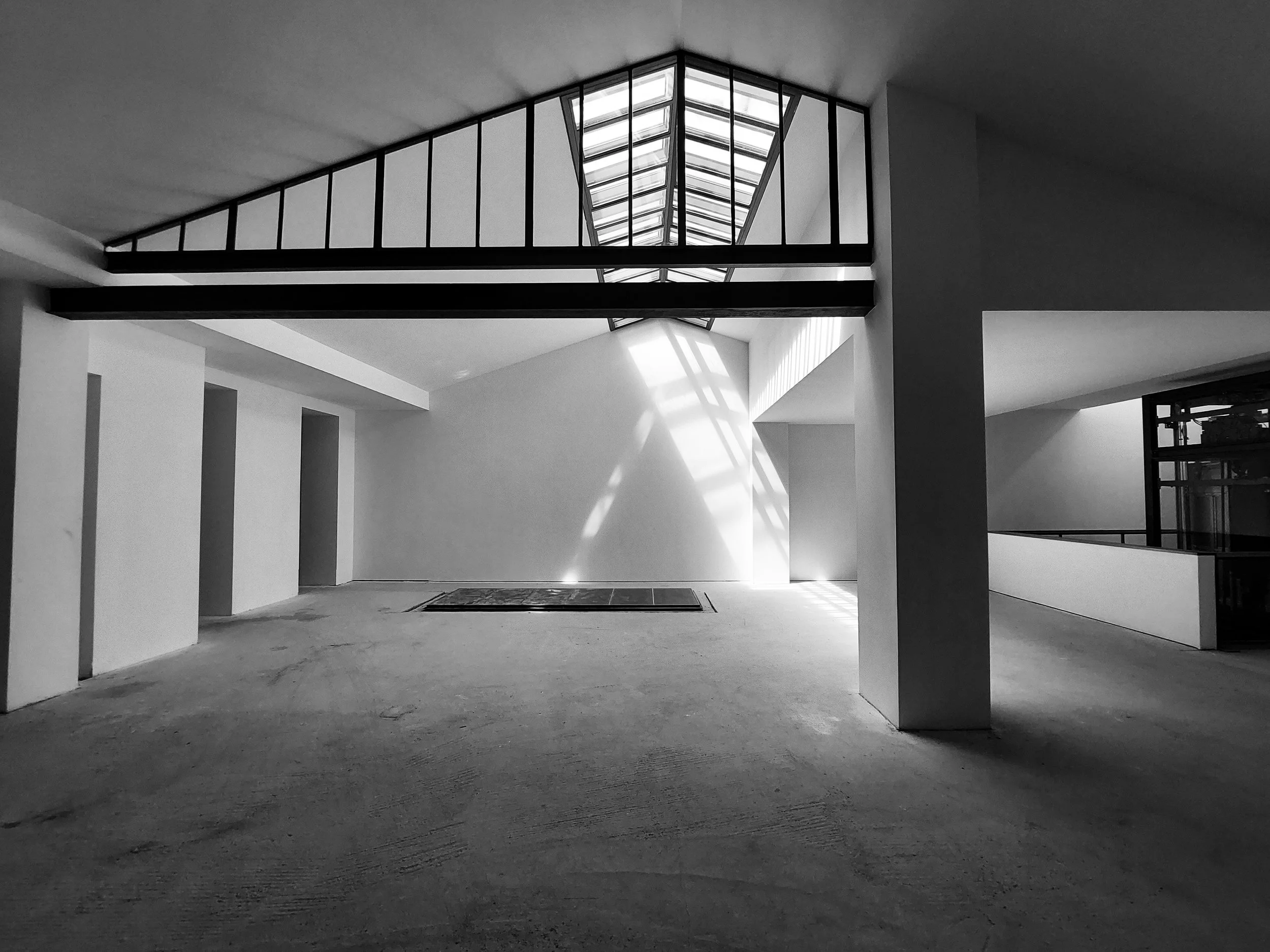 Heritage hospitality interior with skylight — engage Kamil Foltan to commission a Design Review Audit.